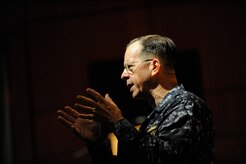 U.S. Navy Adm. Mike Mullen gives his remarks during an all hands call at the base theater on Joint Base Charleston, S.C., June 3, 2010. During his visit, Admiral Mullen fielded questions from Airmen and addressed Department of Defense policy changes and expectations. (U.S. Air Force Photo/James M. Bowman)