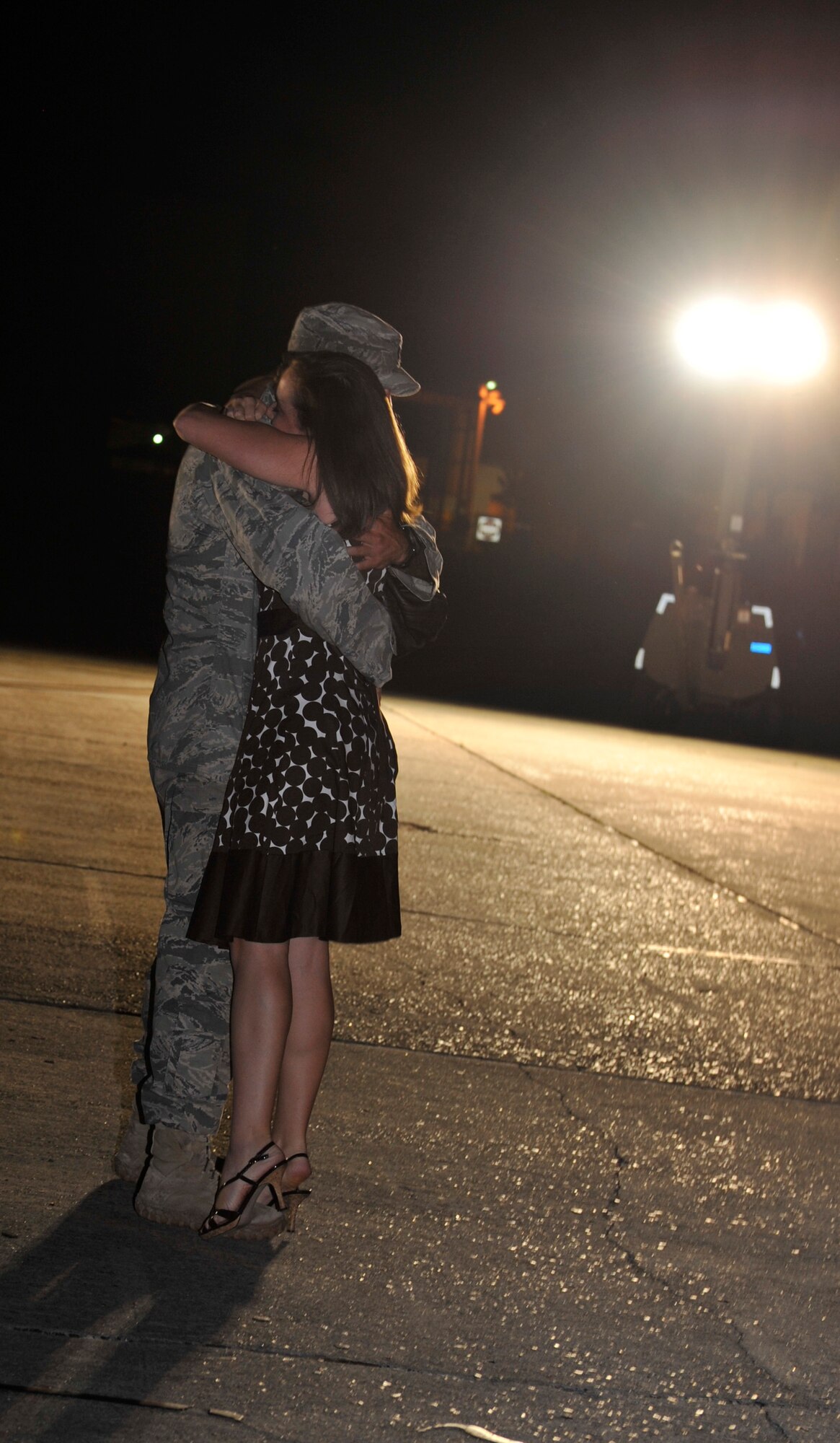 MOODY AIR FORCE BASE, Ga. -- Capt. Kevin O'Byrne, 823rd Security Forces Squadron operations officer, embraces his girlfriend after being deployed to Haiti for four months here June 2. Approximately 40 family members and friends came to welcome them home after a four-month deployment to Haiti. (U.S. Air Force photo by Staff Sgt. Schelli Jones/Released)