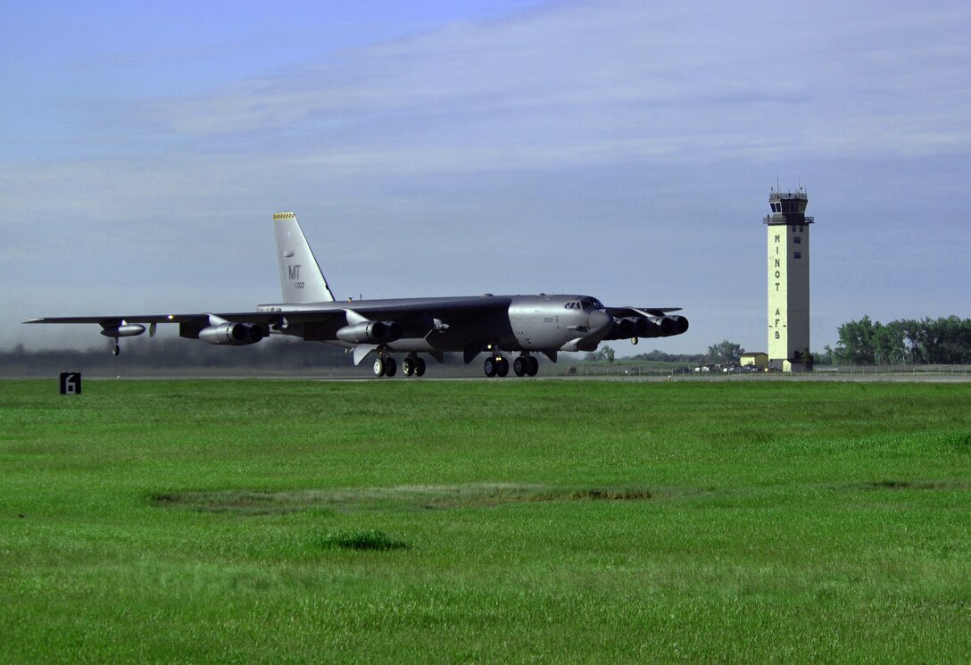 A B-52H Stratofortess takes off on its way to Andersen Air Force Base, Guam, as part of a deployment June 2, 2010, at Minot Air Force Base, N.D. During the six-month deployment, nearly 350 Airmen and several B-52s will provide U.S. Pacific Command with a continuous bomber presence in the Asia-Pacific region. (U.S. Air Force photo/Senior Airman Michael J. Veloz)