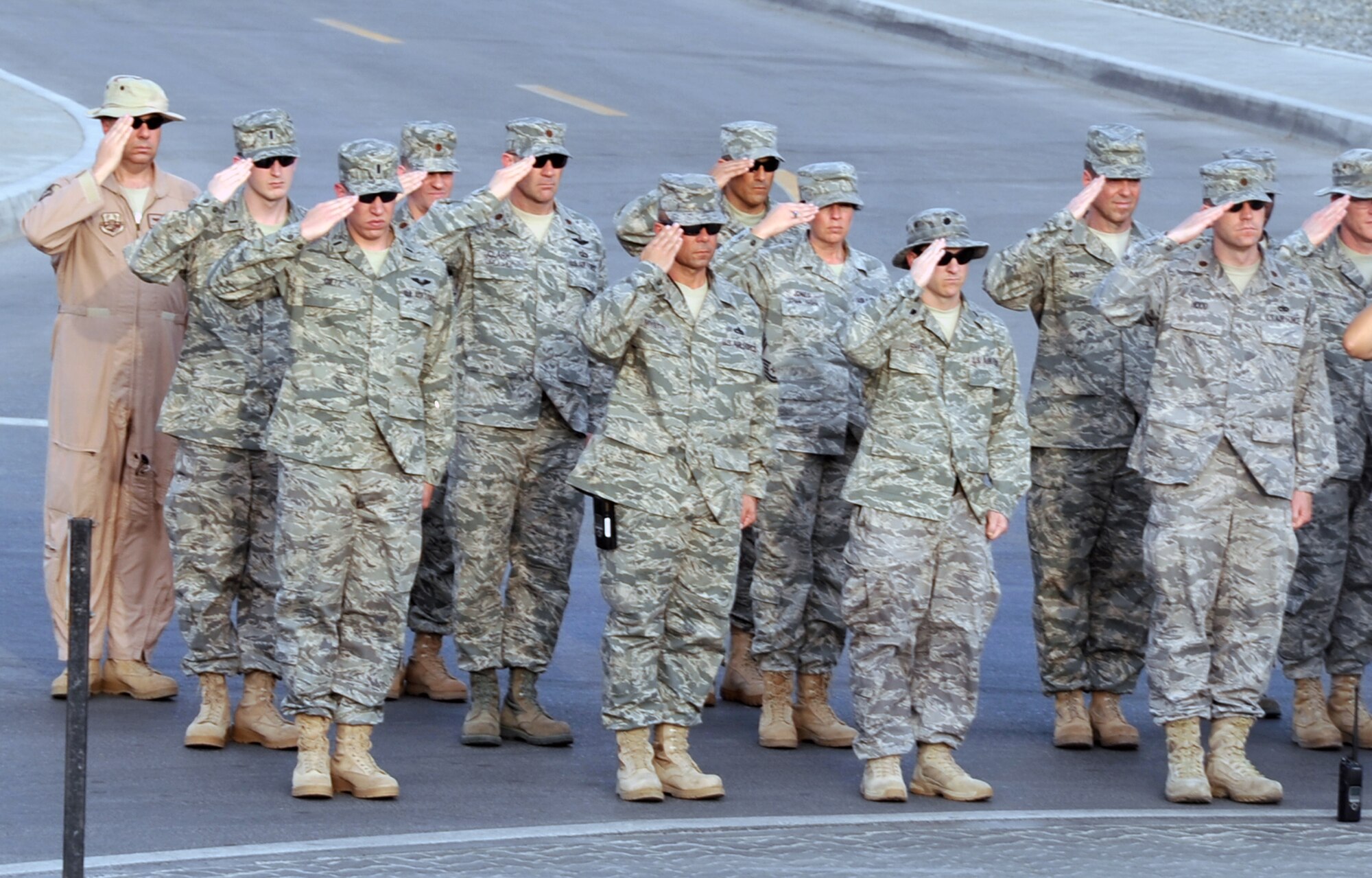 Airmen from the 380th Air Expeditionary Wing Honor Guard as well as from the rest of the wing and associated units participate in a special Memorial Day retreat ceremony at a non-disclosed base in Southwest Asia on May 31, 2010.  The ceremony included the reading of names of fallen service members from the month of May as well as several other remembrance overtures in honor of the holiday. The 380th AEW supports operations Iraqi Freedom and Enduring Freedom and the Combined Joint Task Force-Horn of Africa. (U.S. Air Force Photo/Master Sgt. Scott T. Sturkol/Released)