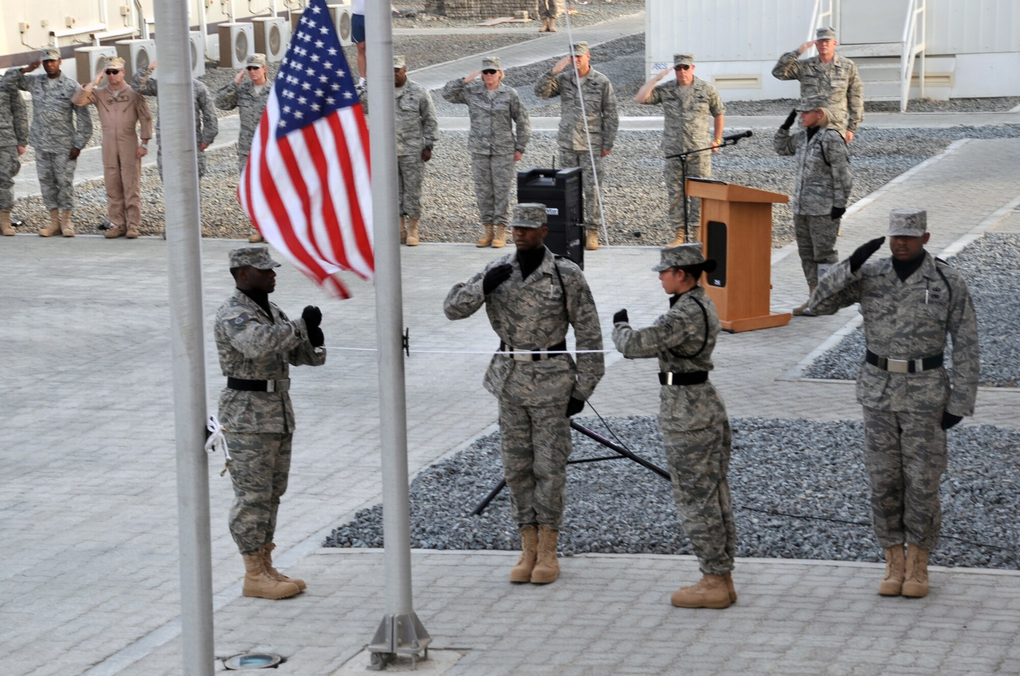 Airmen from the 380th Air Expeditionary Wing Honor Guard as well as from the rest of the wing and associated units participate in a special Memorial Day retreat ceremony at a non-disclosed base in Southwest Asia on May 31, 2010.  The ceremony included the reading of names of fallen service members from the month of May as well as several other remembrance overtures in honor of the holiday. The 380th AEW supports operations Iraqi Freedom and Enduring Freedom and the Combined Joint Task Force-Horn of Africa. (U.S. Air Force Photo/Master Sgt. Scott T. Sturkol/Released)