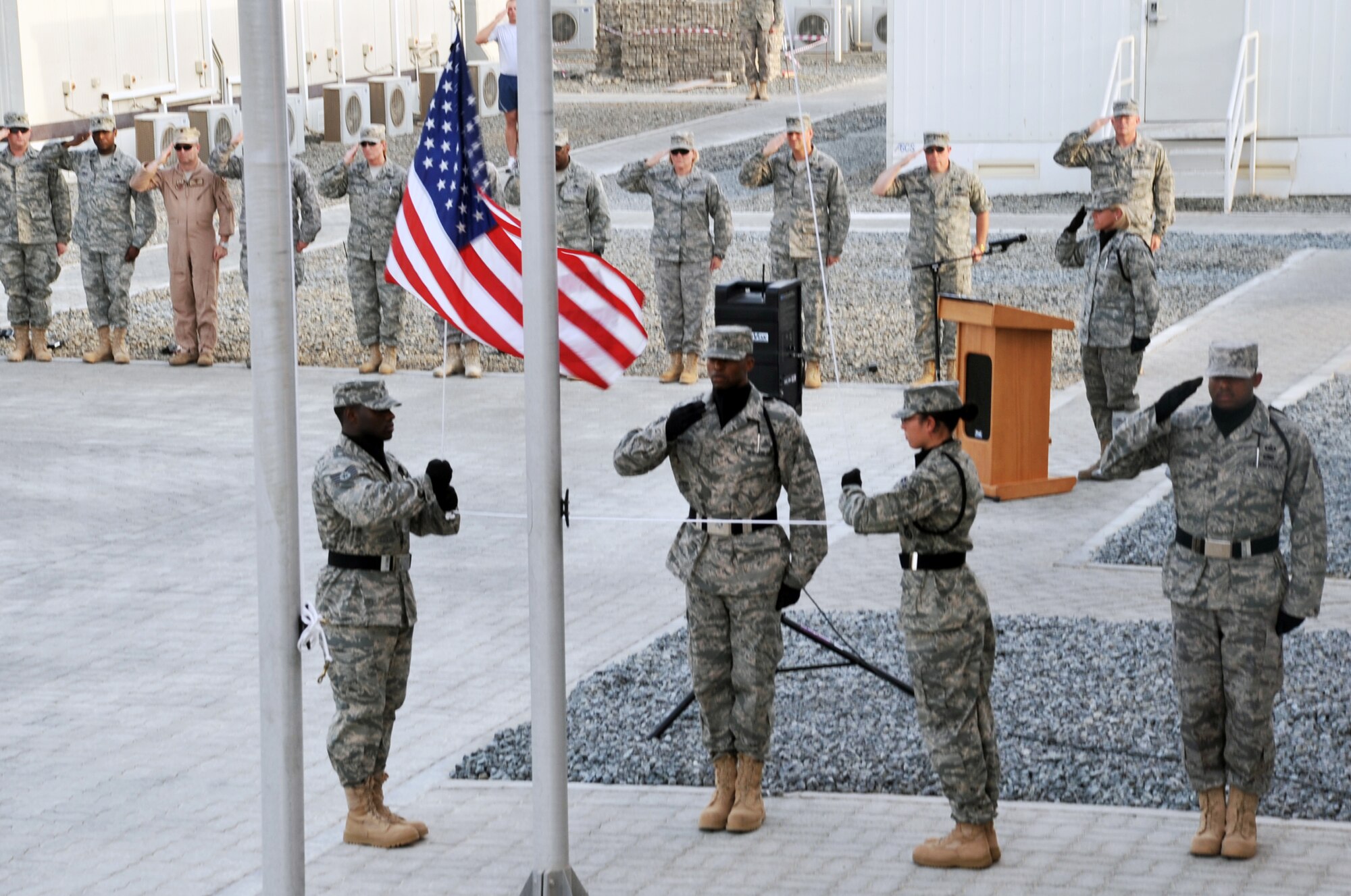 Airmen from the 380th Air Expeditionary Wing Honor Guard as well as from the rest of the wing and associated units participate in a special Memorial Day retreat ceremony at a non-disclosed base in Southwest Asia on May 31, 2010.  The ceremony included the reading of names of fallen service members from the month of May as well as several other remembrance overtures in honor of the holiday. The 380th AEW supports operations Iraqi Freedom and Enduring Freedom and the Combined Joint Task Force-Horn of Africa. (U.S. Air Force Photo/Master Sgt. Scott T. Sturkol/Released)