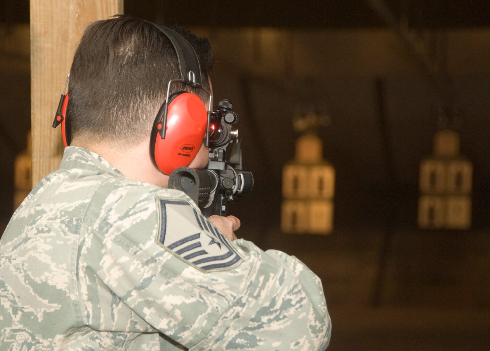 HANSCOM AIR FORCE BASE, Mass. – Master Sgt. Richard Olivarez, 66th Force Support Squadron, takes aim during Hanscom’s Police Week Executive Rifle Match, held on May 15. National Police Week offers Americans an opportunity to commemorate and celebrate law enforcement officers for their service.  (U.S. Air Force photo by Mark Herlihy)