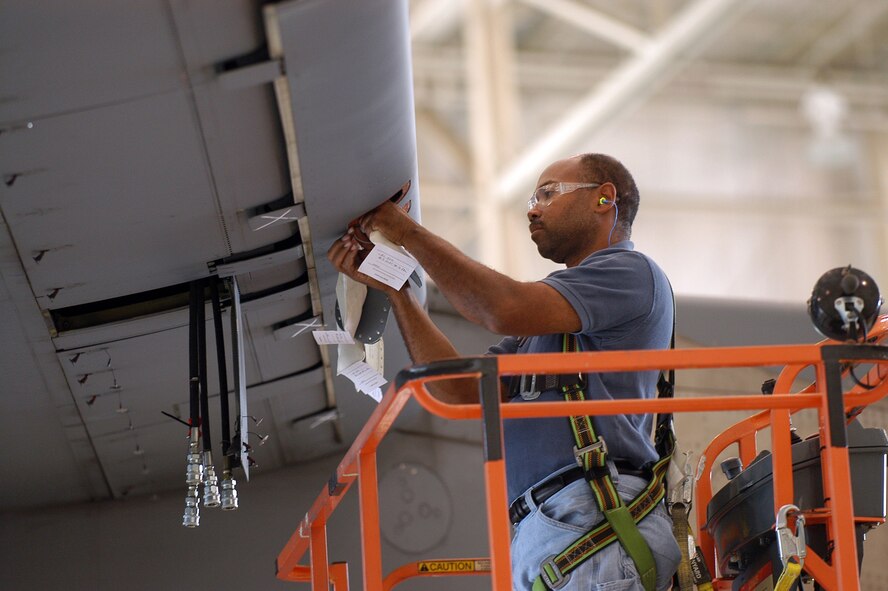 Ryan Mosley,  preps a C-17 #3 slat for removal. U. S. Air Force photo by Sue Sapp