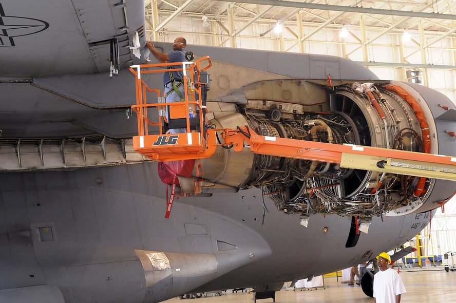Ryan Mosley, on lift,  preps a C-17 #3 slat for removal. The 402nd Maintenance Wing received the 2010 Maintenance Repair & Overhaul Military Center of Excellence Award. U. S. Air Force photo by Sue Sapp