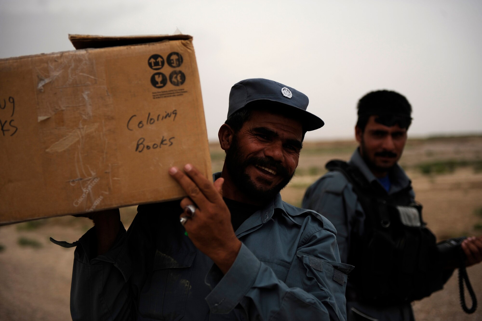 Afghan National Police meet up with Airmen and Soldiers assigned to Provincial Reconstruction Team Zabul, for a Shura mission in Omarkhel village May 22, 2010, in Zabul Province, Afghanistan. (U.S. Air Force photo/Staff Sgt. Manuel J. Martinez/released) 
