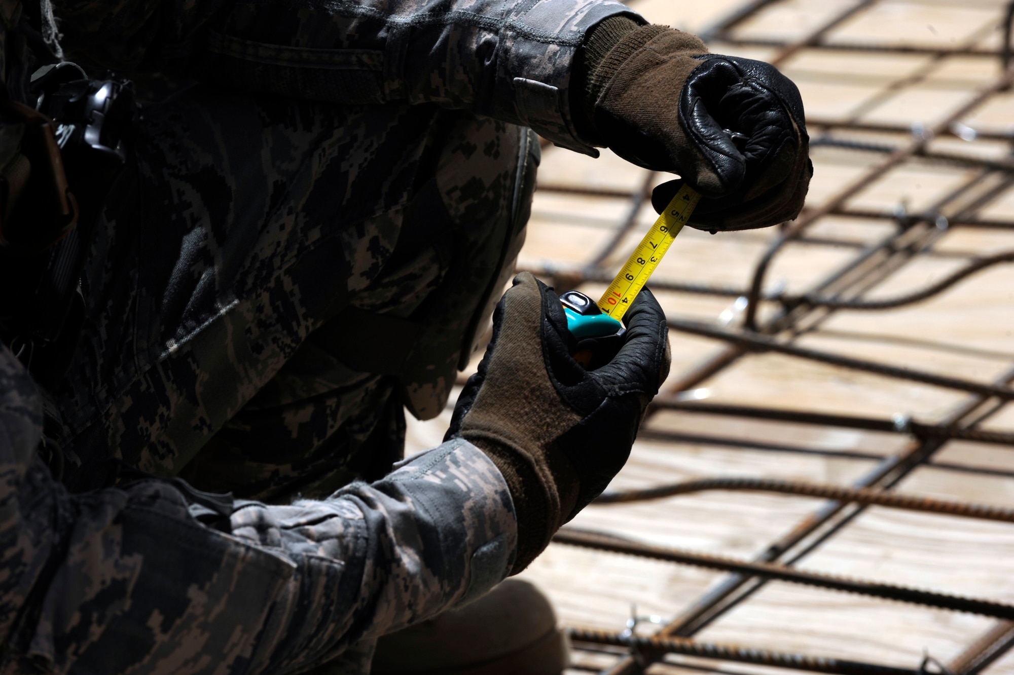 First Lieutenant Keith Yelk, a civil engineer assigned to Provincial Reconstruction Team Zabul, checks construction on the roof of a future outpatient clinic at the S.Malakhi Provincial Hospital May 27, 2010, in Qalat City, Afghanistan. Hospital projects like this help PRT Airmen conduct village medical outreach, a program that facilitates Afghan doctors addressing health concerns in local villages. (U.S. Air Force photo/Staff Sgt. Manuel J. Martinez)