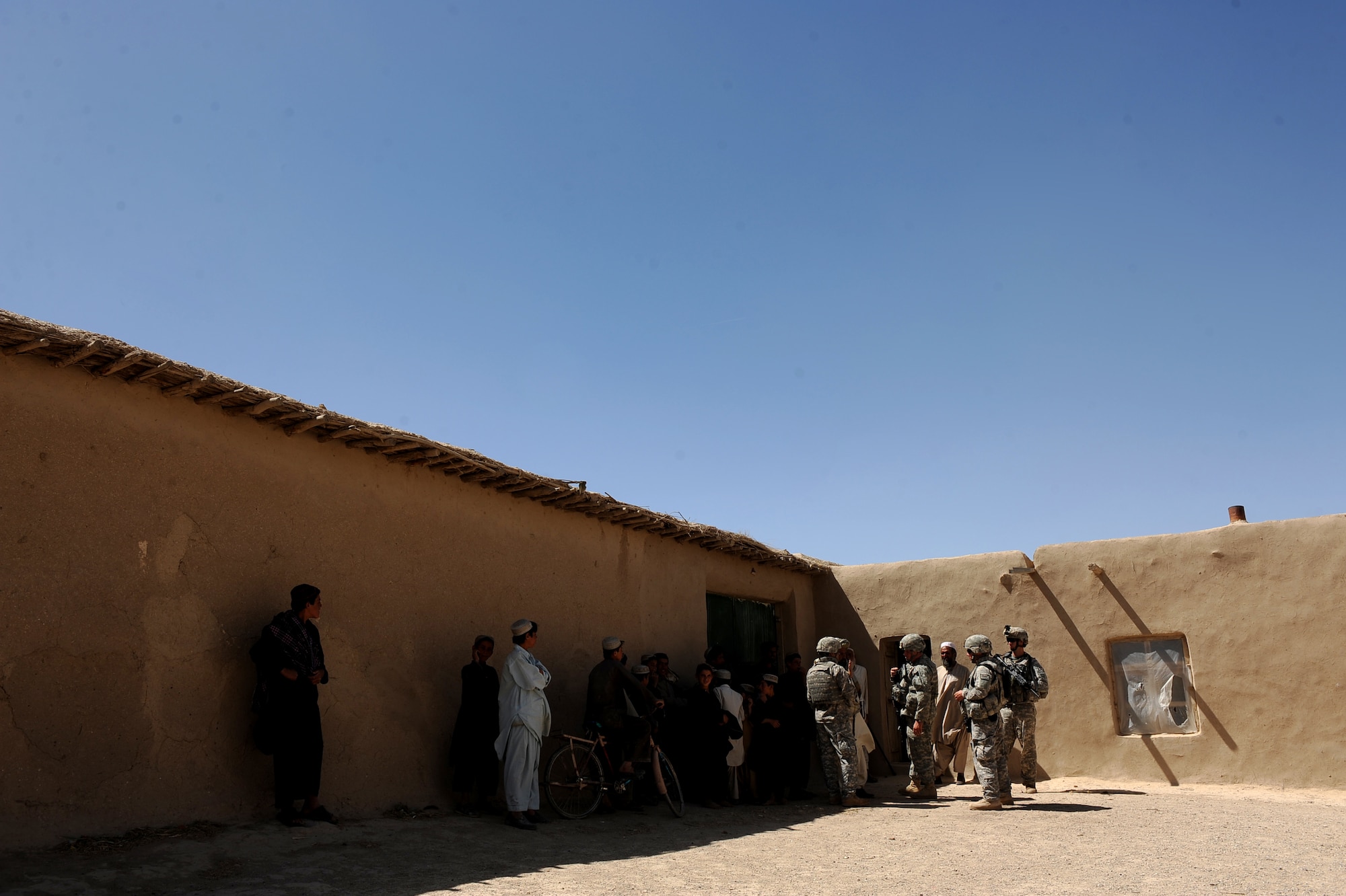 Members of Provincial Reconstruction Team Zabul leave the Khaleqdad Khan village elder?s home after a Shura concerning his village, May 24, 2010, in Khaleqdad Khan, Afghanistan. (U.S. Air Force photo/Staff Sgt. Manuel J. Martinez/released) 
