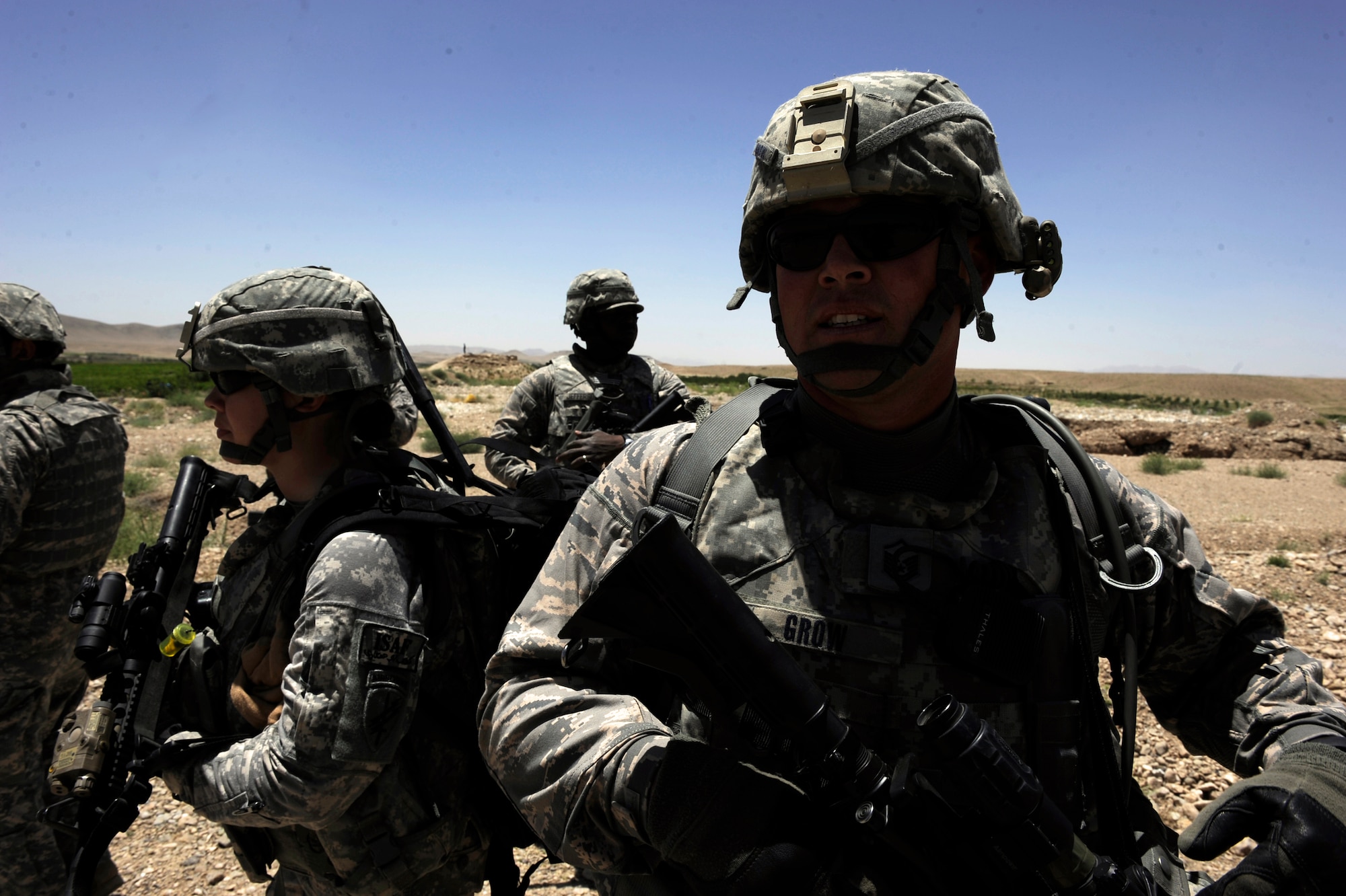 Master Sgt. Donald Grow, the Forward Operating Base Smart mayor assigned to the Provincial Reconstruction Team Zabul, pulls security for his teammates, as they approach a village for a Shura May 24, 2010, in Zabul Province of Afghanistan. (U.S. Air Force photo/Staff Sgt. Manuel J. Martinez/released) 
