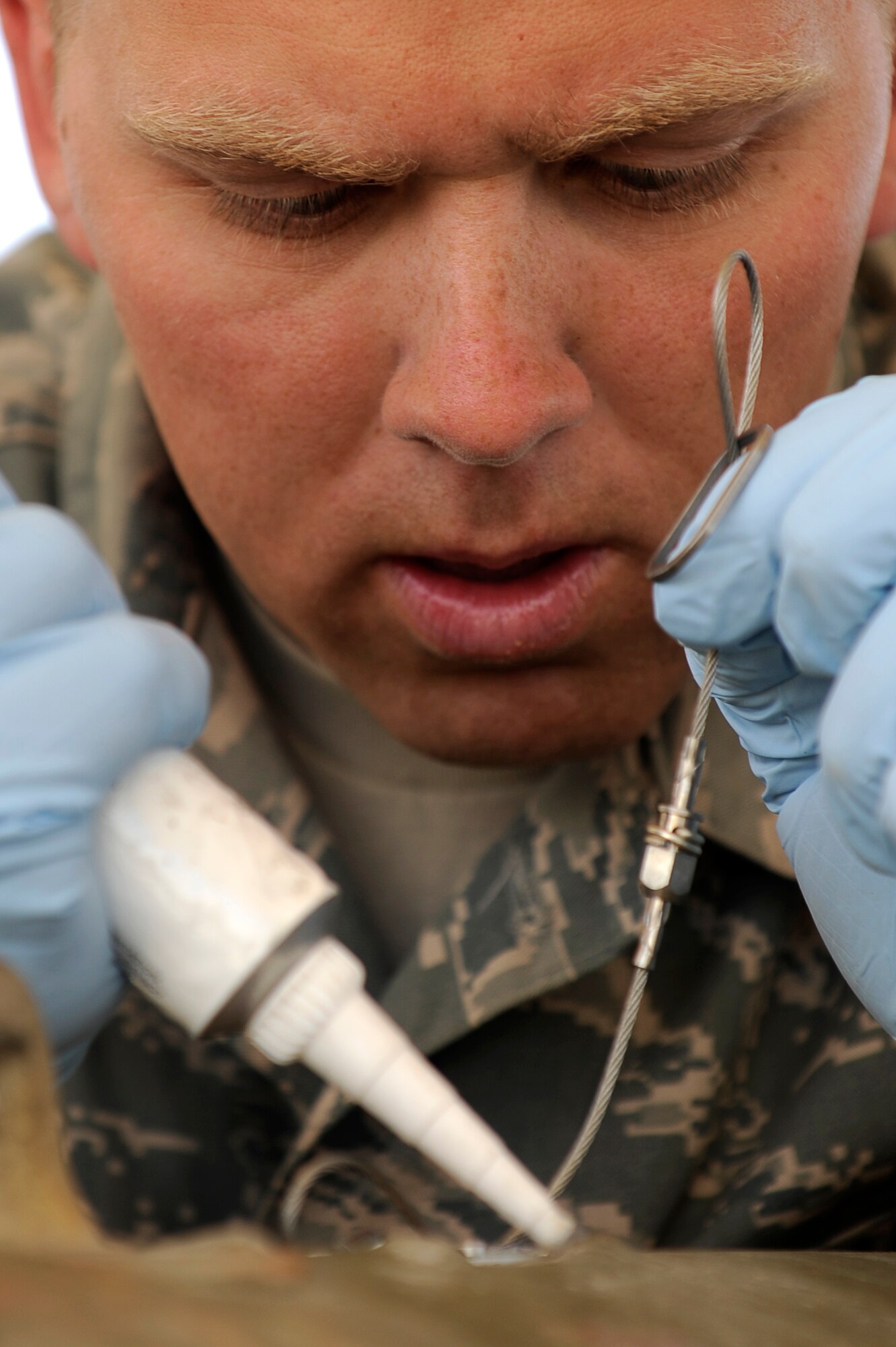 U.S. Air Force Airman 1st Class Nathaniel Wing, 455th Expeditionary Maintenance Squadron/AMMO, works on a 500 lb guided bomb unit at Bagram Airfield, Afghanistan. Airman Wing is deployed from Royal Air Force Base Lakenheath, England, and is from Calhoun, Ga. (U.S. Air Force photo by/ Master Sgt. Jeromy K. Cross/released)