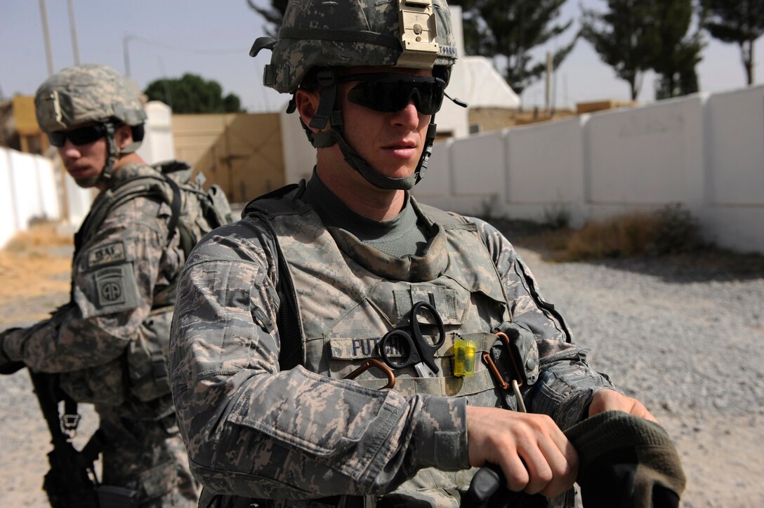 1st Lt. Shane Futchko, a physician assistant assigned to Provincial Reconstruction Team Zabul, gears up for a foot patrol, May 23, 2010, on Forward Operating Base Smart, Afghanistan.  
