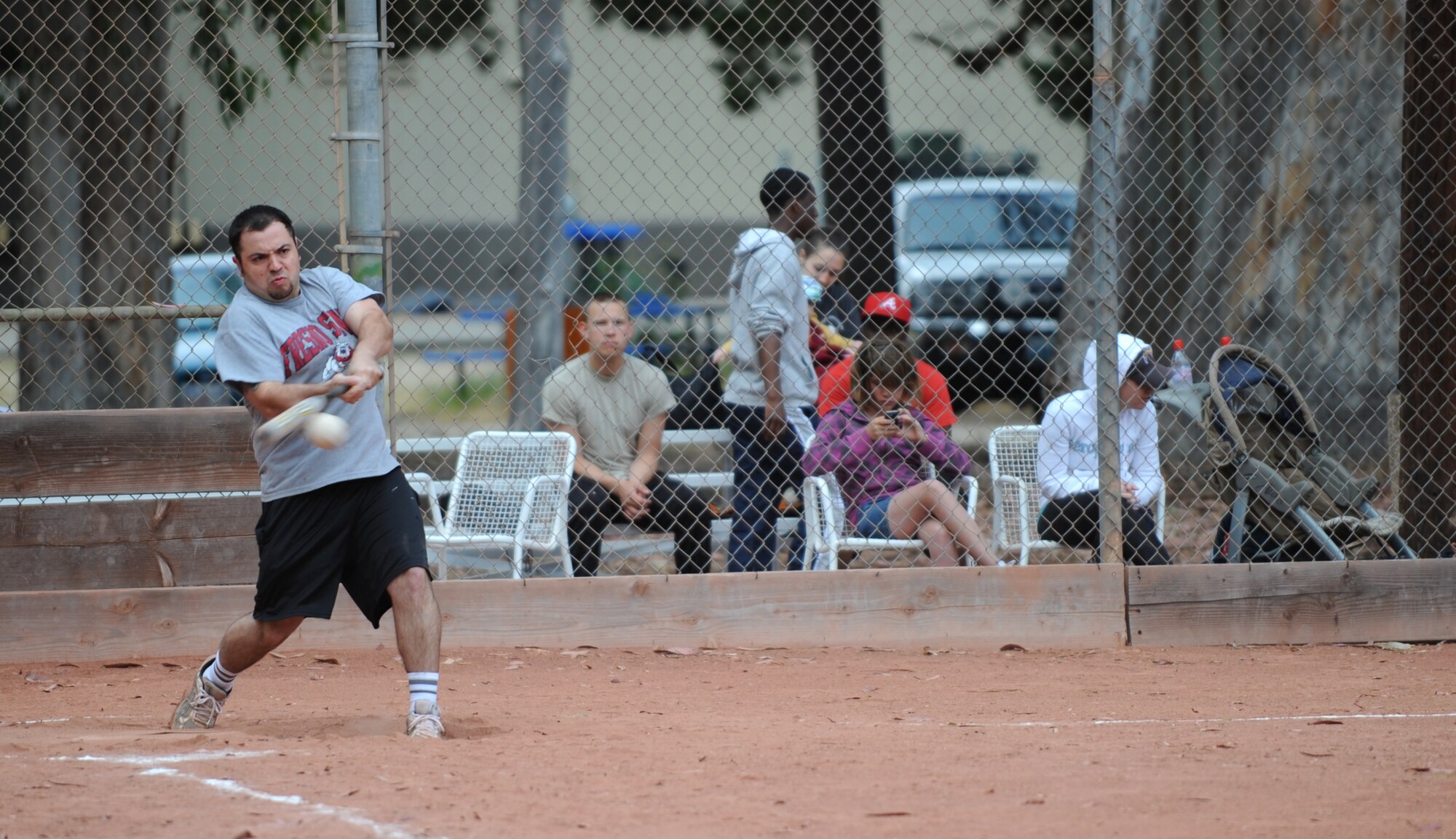 VANDENBERG AIR FORCE BASE, Calif. -- A 30th Force Support Squadron softball team member knocks the ball into the outfield during an intramural softball game here behind the old gym Thursday, June 3, 2010. Fourteen teams are signed up to play in the intramural softball tournament, which will last for approximately two months. (U.S. Air Force photo/Senior Airman Ashley Reed)