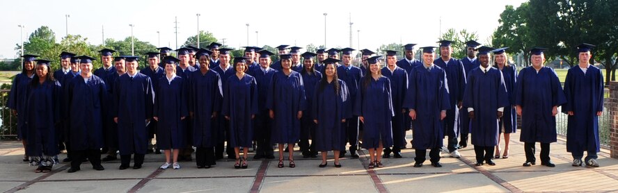 BOSSIER CITY, La. – Barksdale Air Force Base Community College of the Air Force class of 2010 graduates, pose for a group photo prior to their graduation ceremony at the Bossier Civic Center May 27. (U.S. Air Force photo by Senior Airman Joanna M. Kresge)