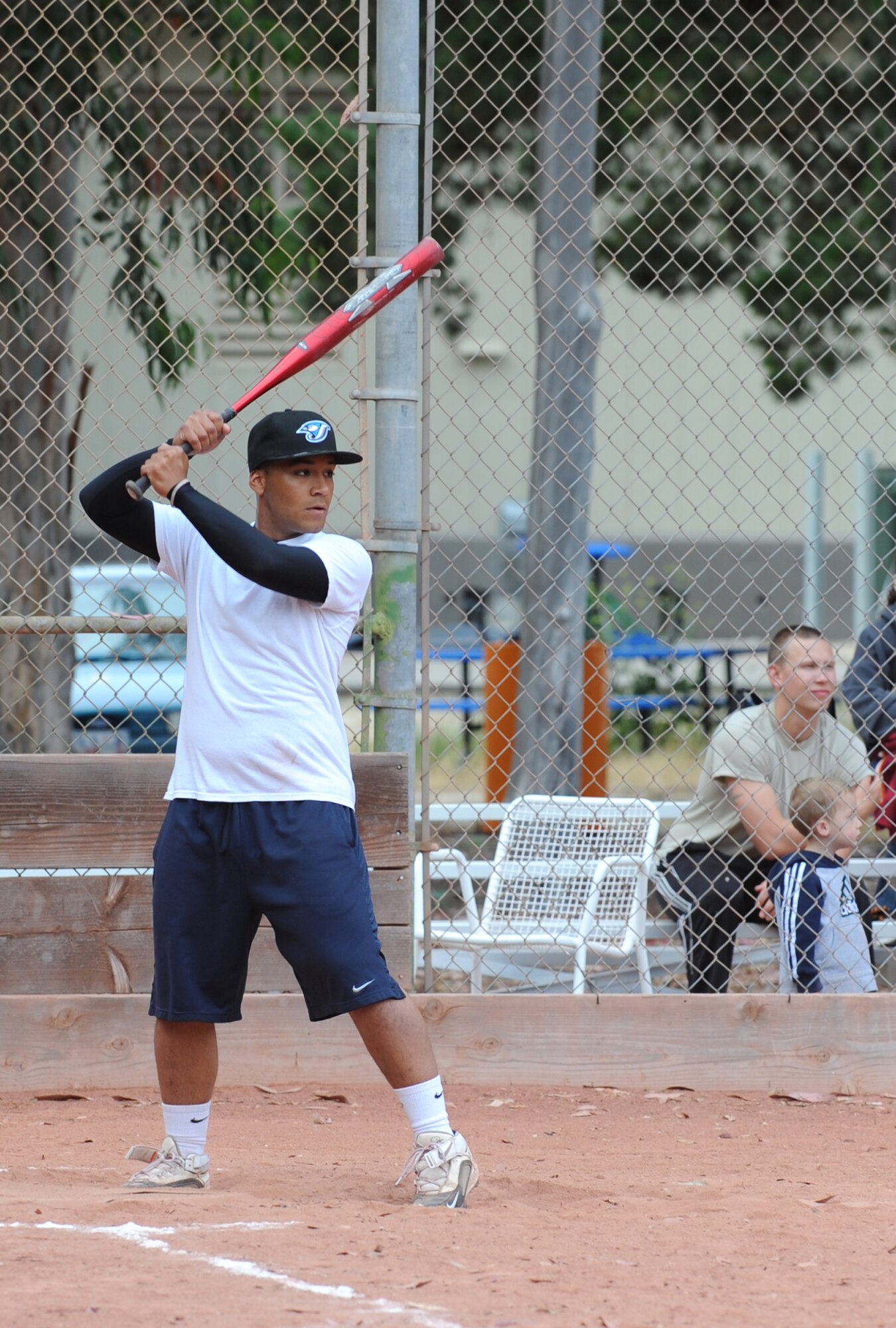 VANDENBERG AIR FORCE BASE, Calif. -- Joel Rivera, a 381st Training Support Squadron softball team member, steps up to the plate during an intramural softball game here behind the old gym Thursday, June 3, 2010. Instructors and students from the 381st TRSS came out to show their support and play ball during the intramural softball tournament. (U.S. Air Force photo/Senior Airman Ashley Reed)