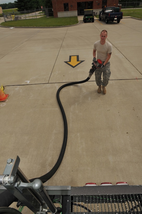 Senior Airman Andrew Kasten, a fuels laboratory technician for the 126th
Fuels Management flight, transfers fuel from holding tanks to a fuel truck
located at the 126th Air Refueling Wing, Scott AFB, Ill. The Illinois Air
National Guard flight was recently named "The Best in the Air National
Guard" and received the Air National Guard Outstanding Fuels Management
Flight Award for the best fuels operations for 2009. (U.S. Air Force photo
by Master Sgt. Ken Stephens)