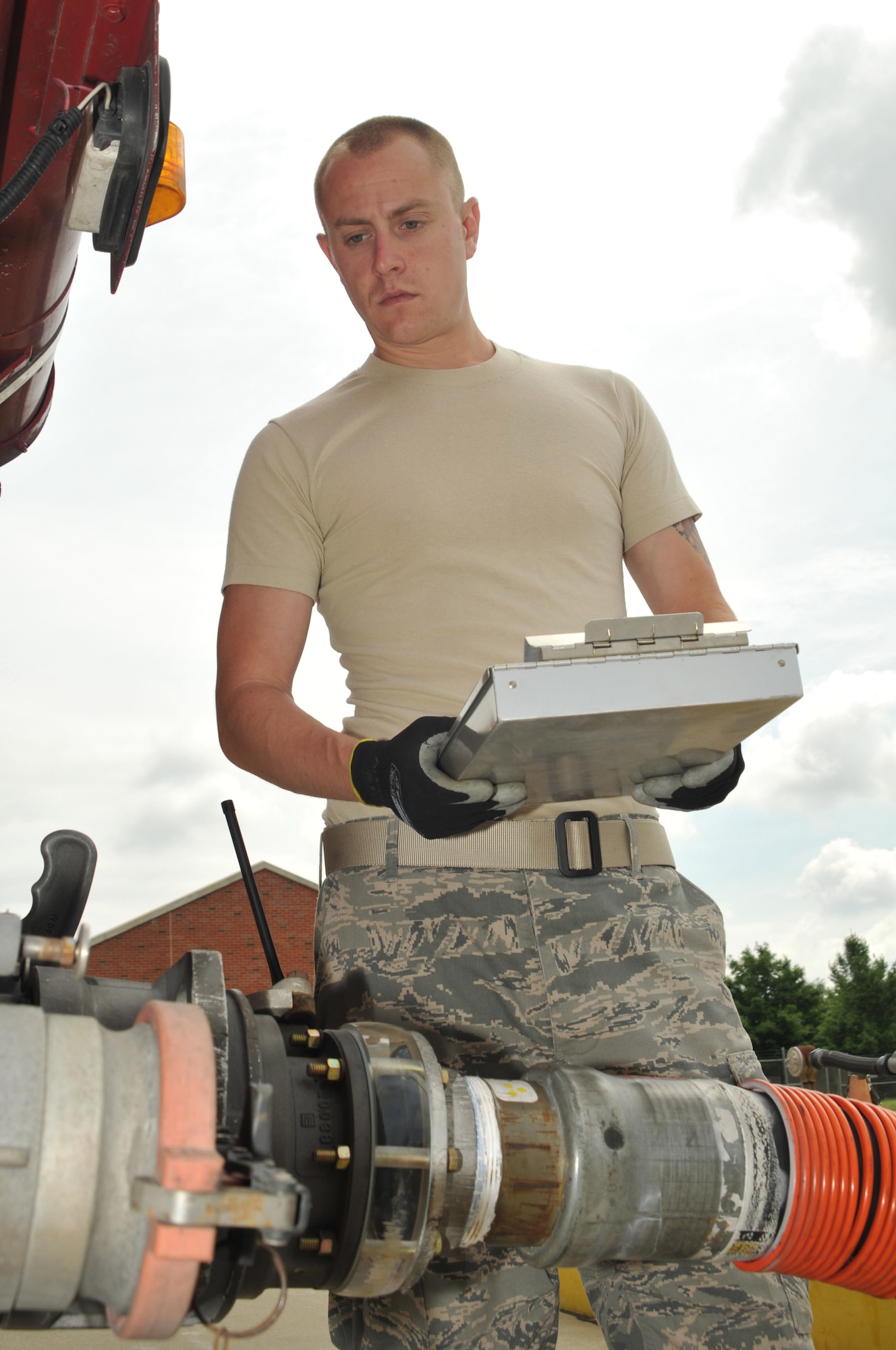 Senior Airman Andrew Kasten, a fuels laboratory technician for the 126th
Fuels Management flight, transfers fuel to holding tanks located at the
126th Air Refueling Wing, Scott AFB, Ill. The Illinois Air National Guard
flight was recently named "The Best in the Air National Guard" and received
the Air National Guard Outstanding Fuels Management Flight Award for the
best fuels operations for 2009. (U.S. Air Force photo by Master Sgt. Ken
Stephens)