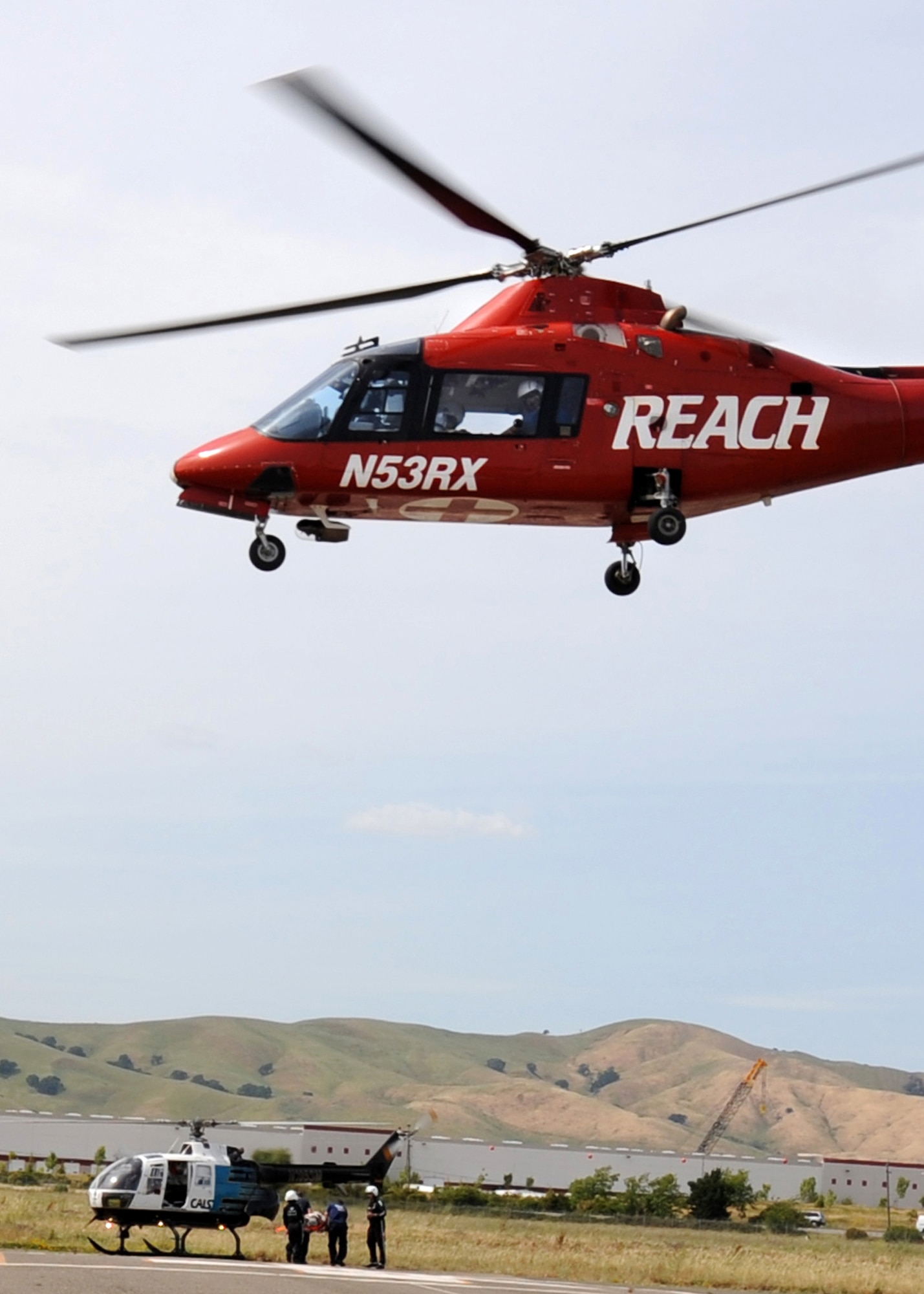 A civilian air ambulance transports a simulated injured patient at an emergency response exercise at Travis Air Force Base, California on 12 May 2010.  Military personal and local civilian emergency organizations worked together during the exercise.  (U.S. Air Force photo by Civ/Jay Trottier)