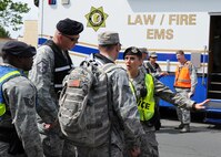 Master Sergeant Tina Russell, left, discusses law enforcement actions with the security team during an emergency response exercise at Travis Air Force Base, California on 12 May 2010.  MSgt Russell is a member of 60th Security Forces Squadron. (U.S. Air Force photo by Civ/Jay Trottier)