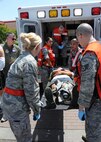 Medical personal transport a patient after a simulated explosion during an emergency response exercise at Travis Air Force Base, California on 12 May 2010 (U.S. Air Force photo by Civ/Jay Trottier)