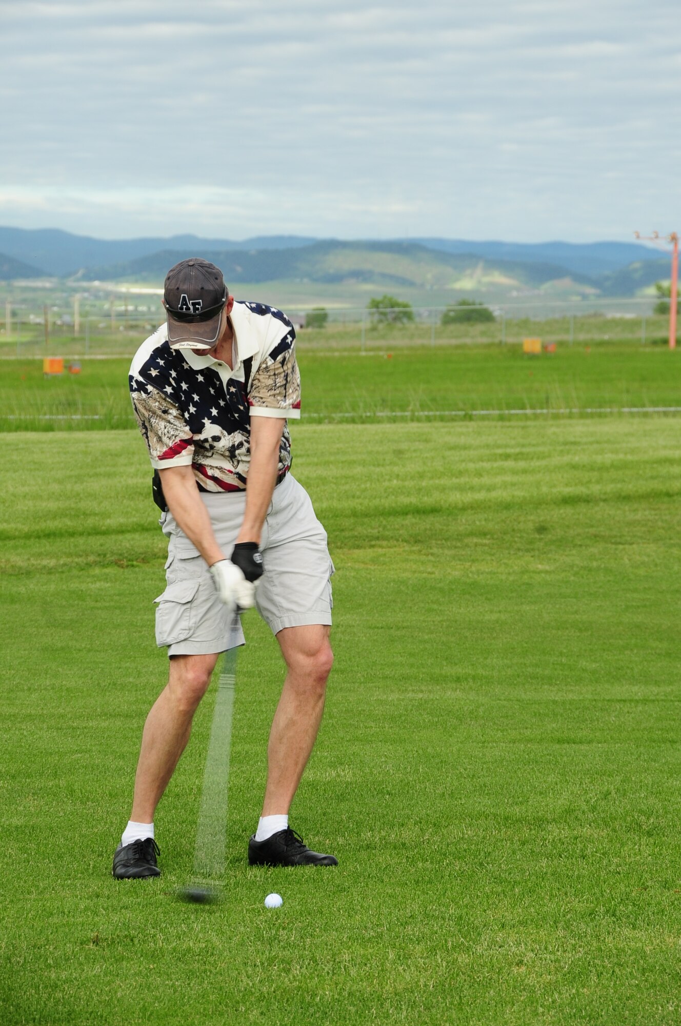 ELLSWORTH AIR FORCE BASE, S.D. -- Master Sgt. David Wells, 28th Munitions Squadron first sergeant, chips a golf ball towards the green during the Diamond in the Rough golf tournament, June 4.  The First Sergeant's Association sponsored the tournament as a way to raise morale. (U.S. Air Force photo/Airman 1st Class Anthony Sanchelli)