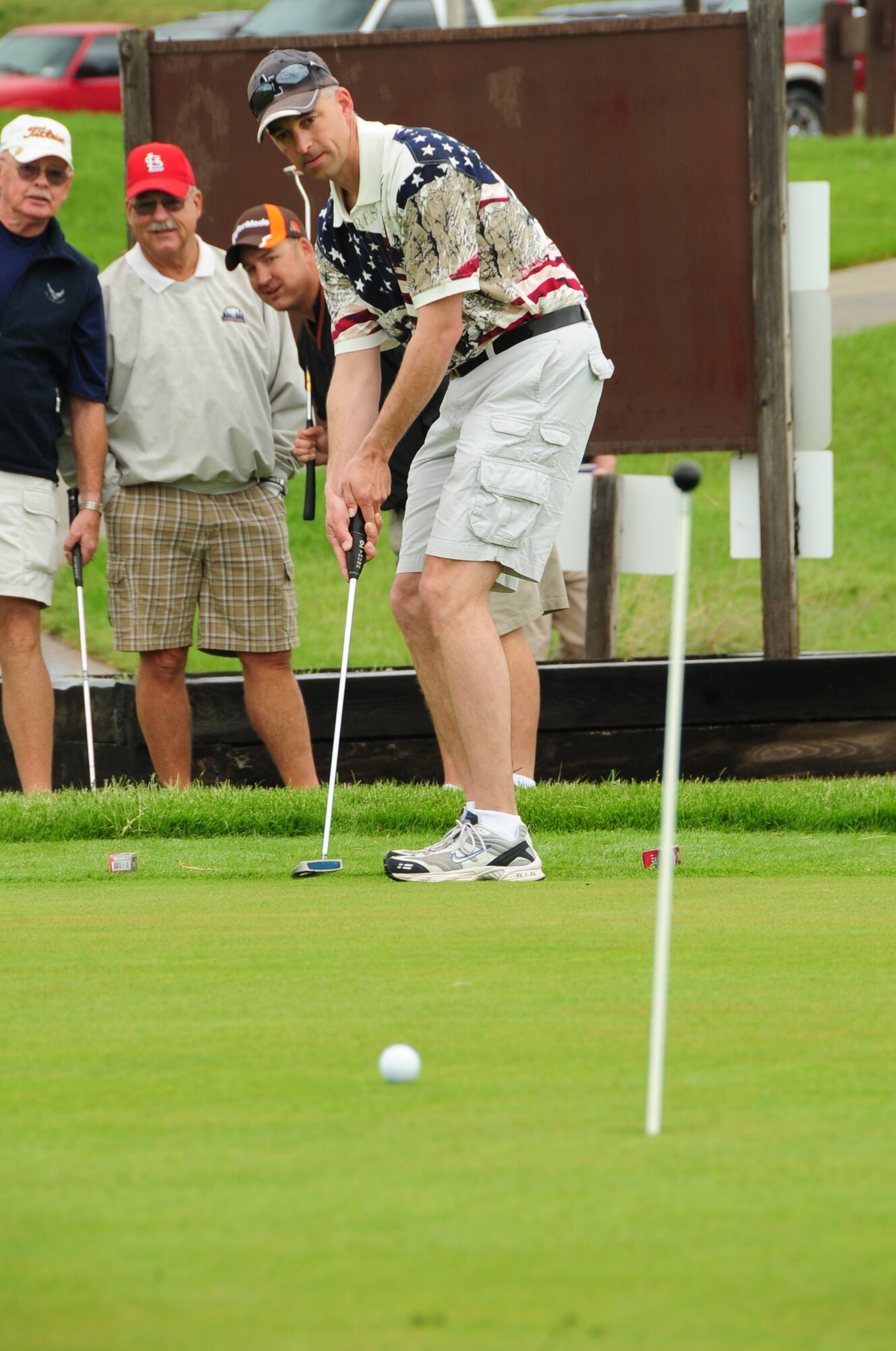 ELLSWORTH AIR FORCE BASE, S.D. -- Master Sgt. David Wells, 28th Munitions Squadron first sergeant, hits a golf ball during a putting competition, June 4.  The putting competition was the first event during the Diamond in the Rough golf tournament sponsored by the First Sergeant's Association. (U.S. Air Force photo/Airman 1st Class Anthony Sanchelli)