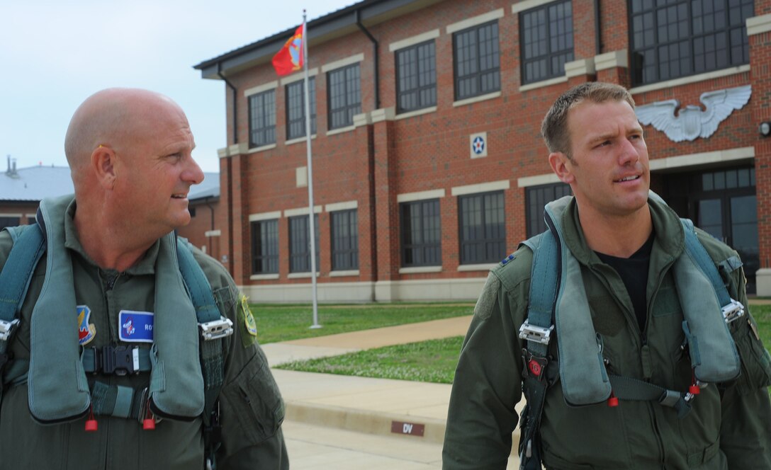 LANGLEY AIR FORCE BASE, Va –  Steve Mallon, Langley Civic Leaders Association president, and Capt. Brent Tittle, 71st Fighter Squadron pilot, approach their F-15 Eagle for an orientation flight June 3.  The association addresses the need for communication between Langley personnel and the local community and supports several base activities and programs. (U.S. Air Force photo/Staff Sgt. Barry Loo)