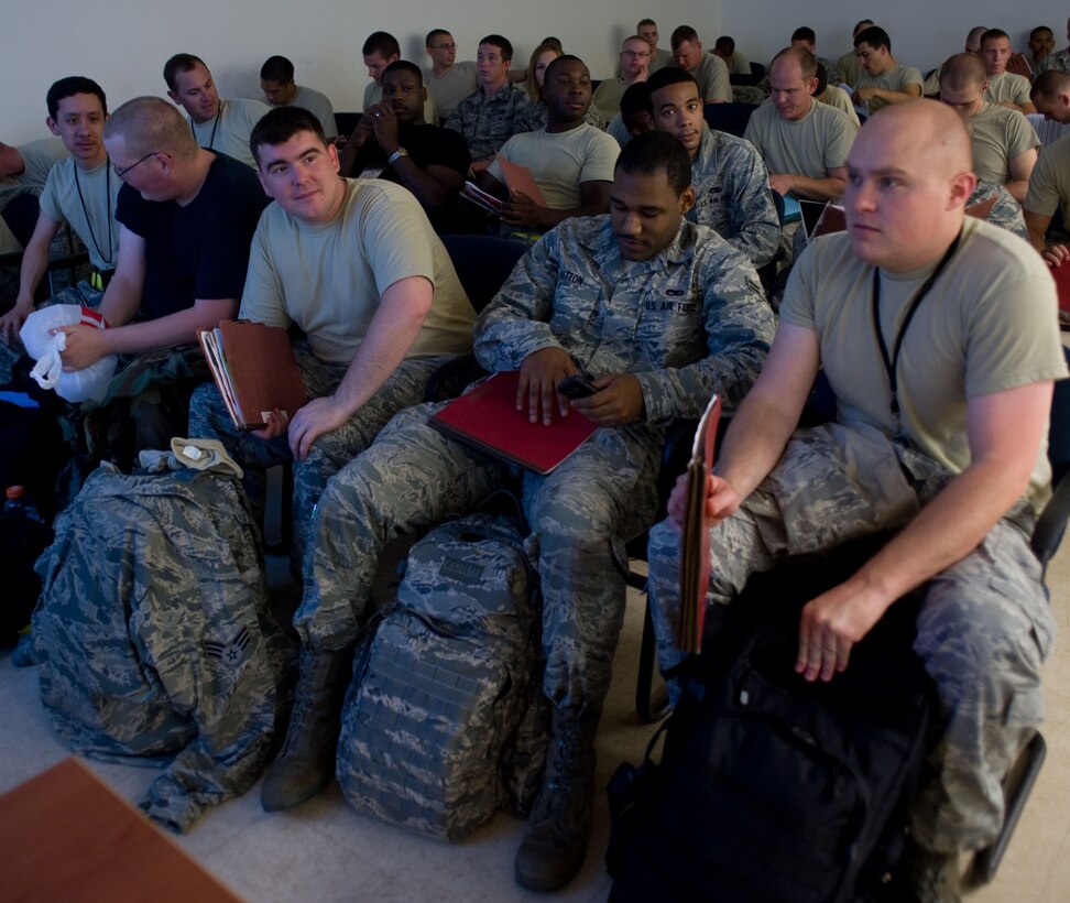 LANGLEY AIR FORCE BASE, Va. – Langley Airmen attend a personnel deployment function briefing prior to their deployment to Andersen Air Force Base, Guam, June 2. The deployment, which will last approximately four months, is a prudent measure to maintain a credible deterrent posture and presence for the region and demonstrate a continued U.S. commitment to fulfilling security responsibilities throughout the Western Pacific. (U.S. Air Force photo/Staff Sgt. Barry Loo)