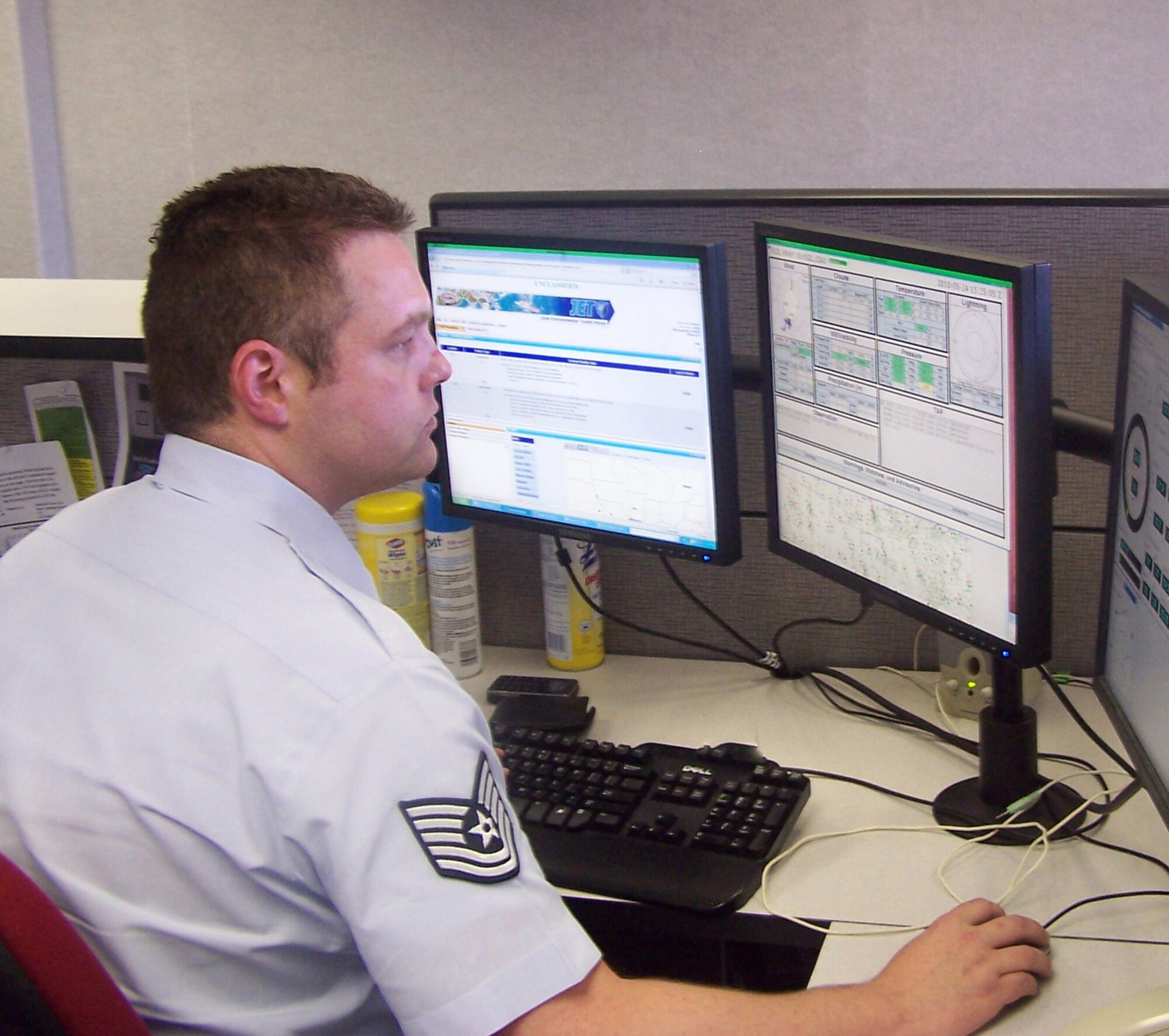 Tech Sgt. Robert B. Clark performs forecasting tasks with the Joint Environmental Toolkit at Whiteman AFB, Mo., May 21. The 651st Electronic Systems Squadron recently awarded a contract for the JET Increment 2 Re-vector that will change how weather information is provided to combat forces. (Courtesy photo)
