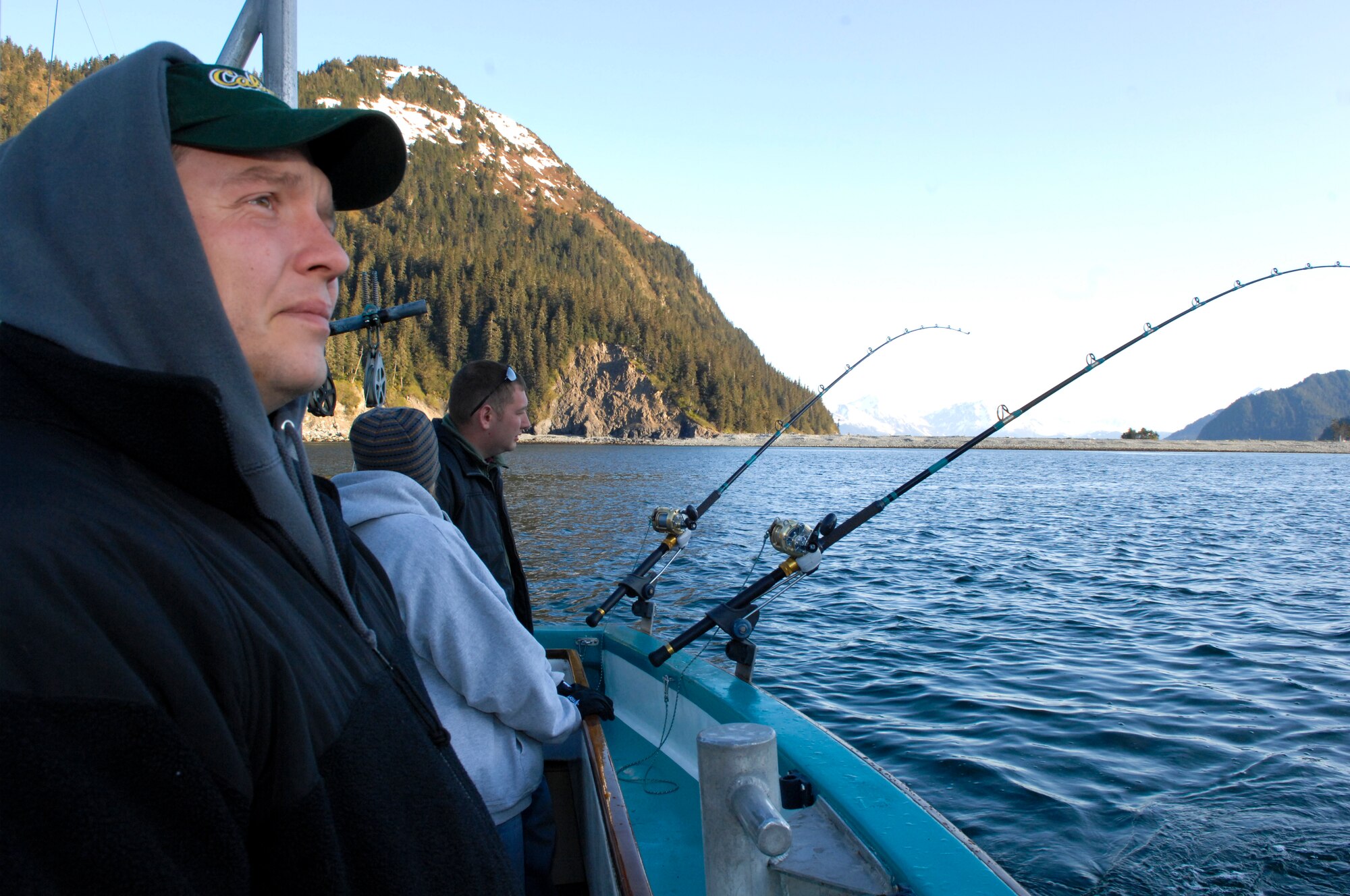 Members of the Fourth Annual Armed Service Veteran Combat Fishing Tournament wait paitently while watching their fishing poles. The tournament is the largest military appreciation fishing tournament in the nation. (Air Force photo by Airman 1st Class Jack Sanders)
