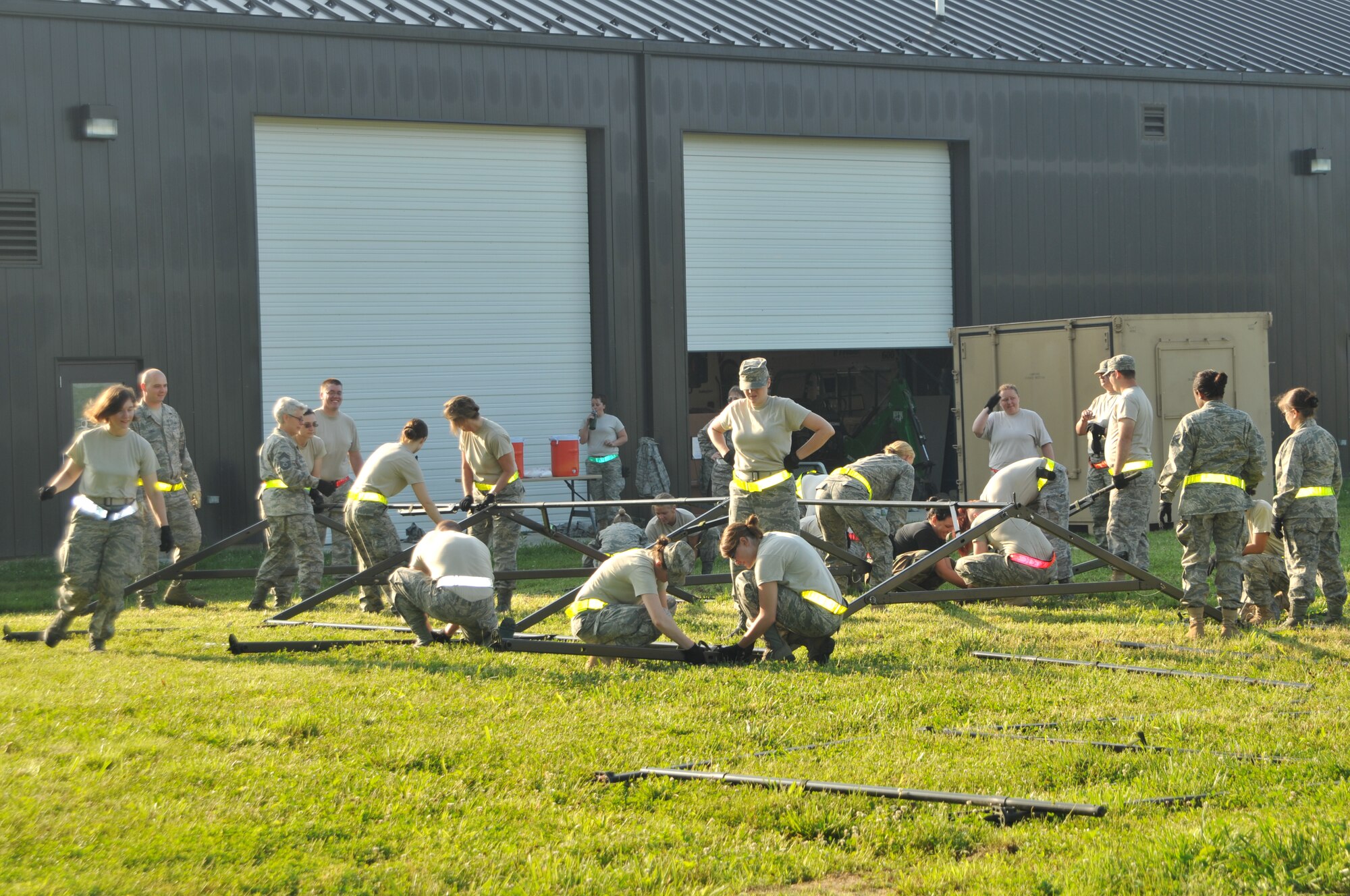The 126th Force Support Squadron erect tents at the start of a three day
bivouac exercise at Scott AFB, Ill. Units of the 126th Air Refueling Wing,
Illinois Air National Guard, routinely practice deployment procedures to
maintain their state of readiness. (U.S. Air Force photo by Tech Sgt.
Johnathon Orrell)