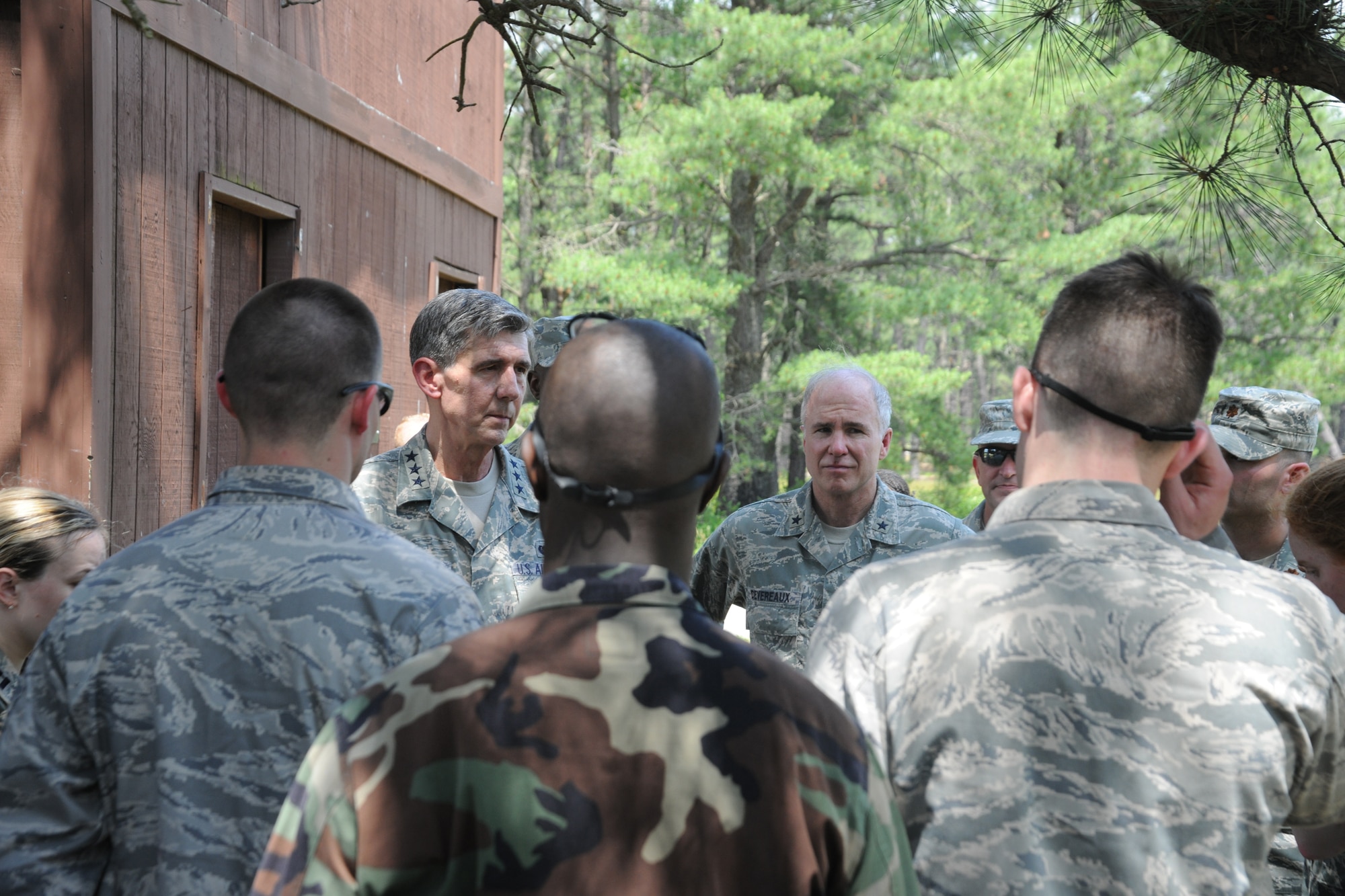 Lt. Gen. Richard Harding, Air Force Judge Advocate General and Brig. Gen. Richard Devereaux, U.S. Air Force Expeditionary Center commander, meet with students attending the Center's JA functional training June 3. General Harding and other JAG leaders visited Joint Base McGuire-Dix-Lakehurst, N.J. to conduct an inspection on the 87th Air Base Wing Legal Office. (Photo by Staff Sgt. Zachary Wilson)

