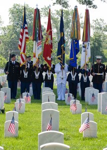 LANGLEY AIR FORCE BASE, Va. -- Members of the Joint Service Color Guard stand at attention during the Memorial Day Ceremony at Hampton National Cemetery May 31.  The ceremony was held to honor servicemembers lost in the line of duty.  (U.S. Air Force photo/Senior Airman Zachary Wolf)
