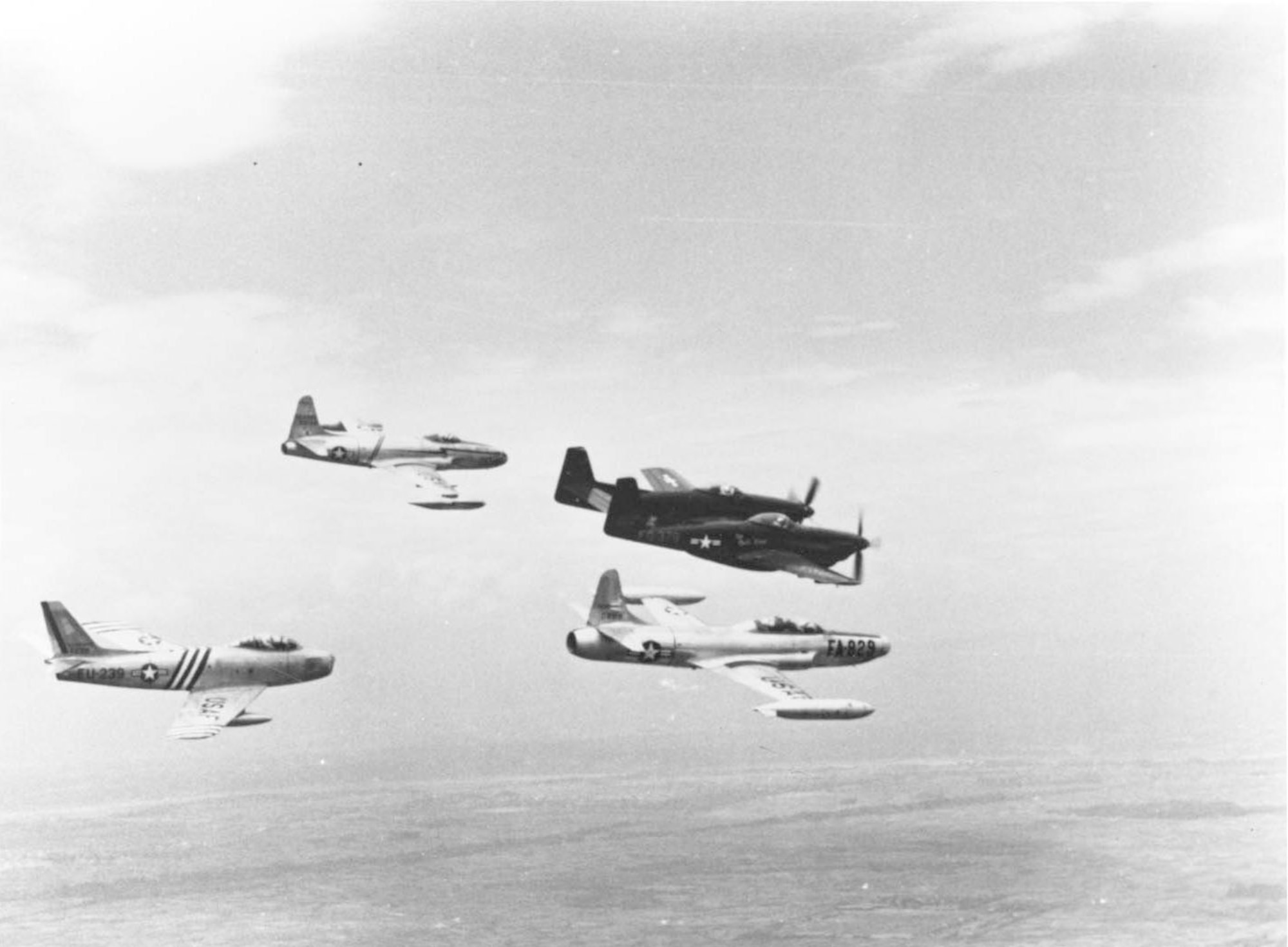 In June 1950 the USAF’s primary day superiority fighter in the Far East was the straight-wing jet F-80 (upper left). The propeller-driven F-82 (upper right) was the primary night fighter. The faster, swept-wing F-86 Sabre (lower left) took over the day fighter role from the F-80 in late 1950, while the jet-powered F-94 (lower right) replaced the F-82 in 1951. (U.S. Air Force photo)