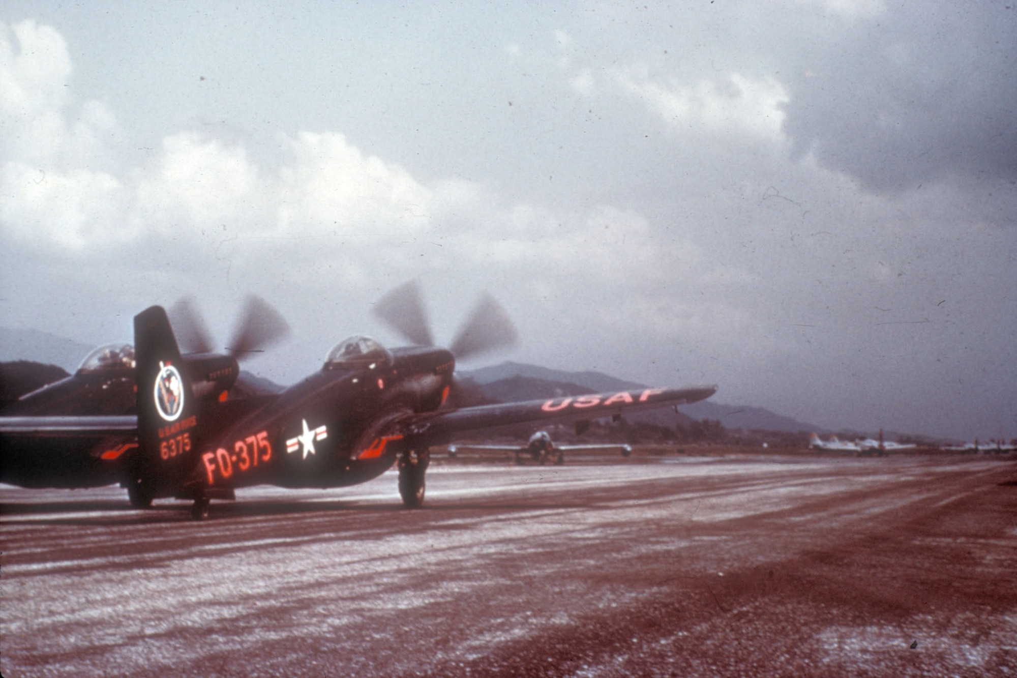 F-82G taking off from a rough airstrip in Korea. Although aviation engineers finished the first hard runways by the end of 1951, many of the "K" bases remained unpaved until the closing months of the war. (U.S. Air Force photo)