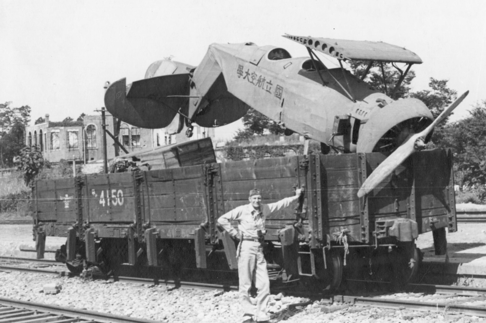 After day raids became too costly, the communists resorted to dropping grenades and small bombs from old biplanes at night. This downed "Bedcheck Charlie" was a Japanese Tachikawa Ki-9 left over from World War II. (U.S. Air Force photo)