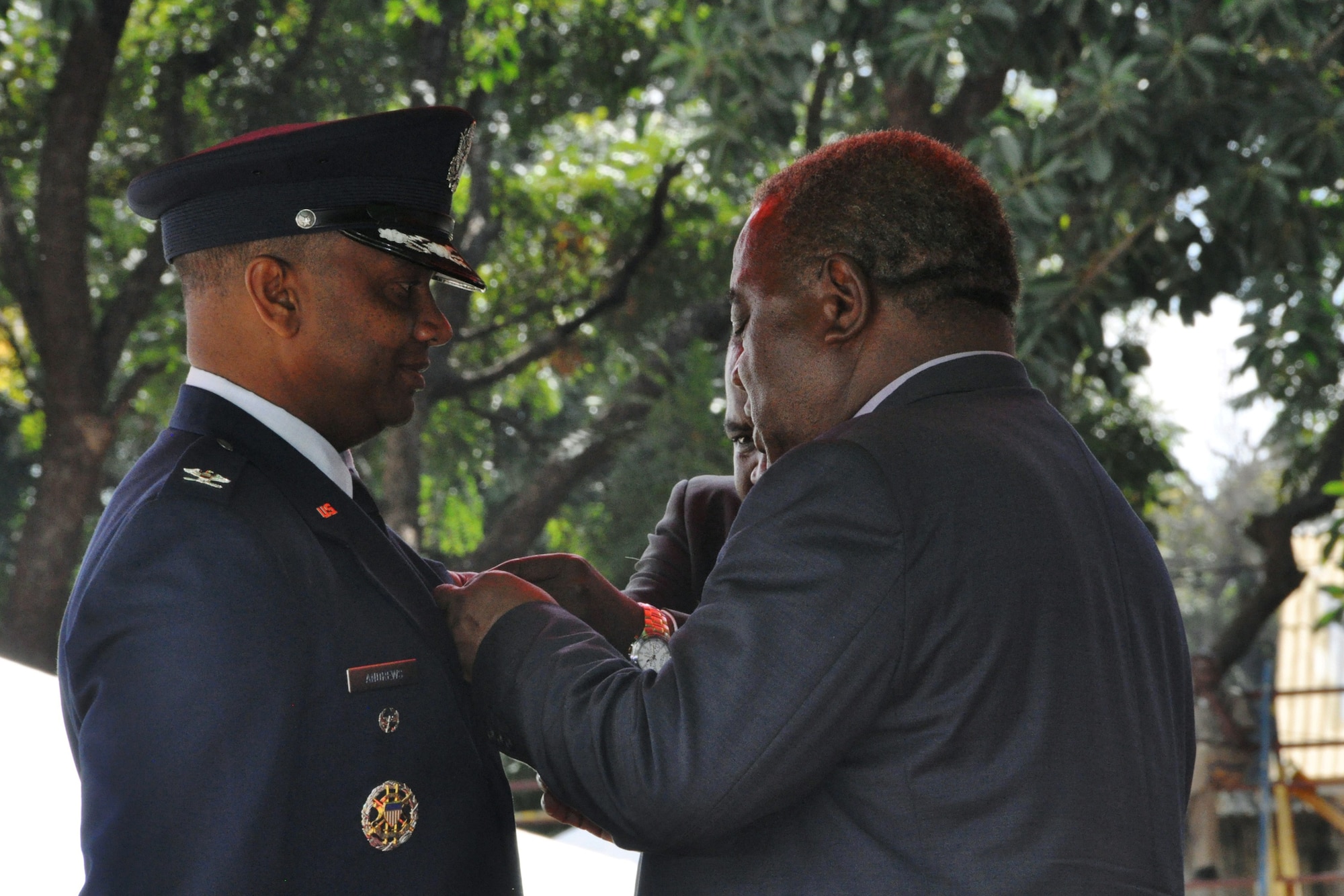 Zambian President Rupiah Banda awards Col. Keith Andrews the Medal of Gallantry May 25, 2010, at Lusaka, Zambia, for the rescue of two Zambian women in the Zambezi River at Victoria Falls a year earlier. Colonel Andrews was visiting the area as part of an Air Force Air War College regional study program tour. (U.S. Air Force photo/Staff Sgt. Amanda McCarty)