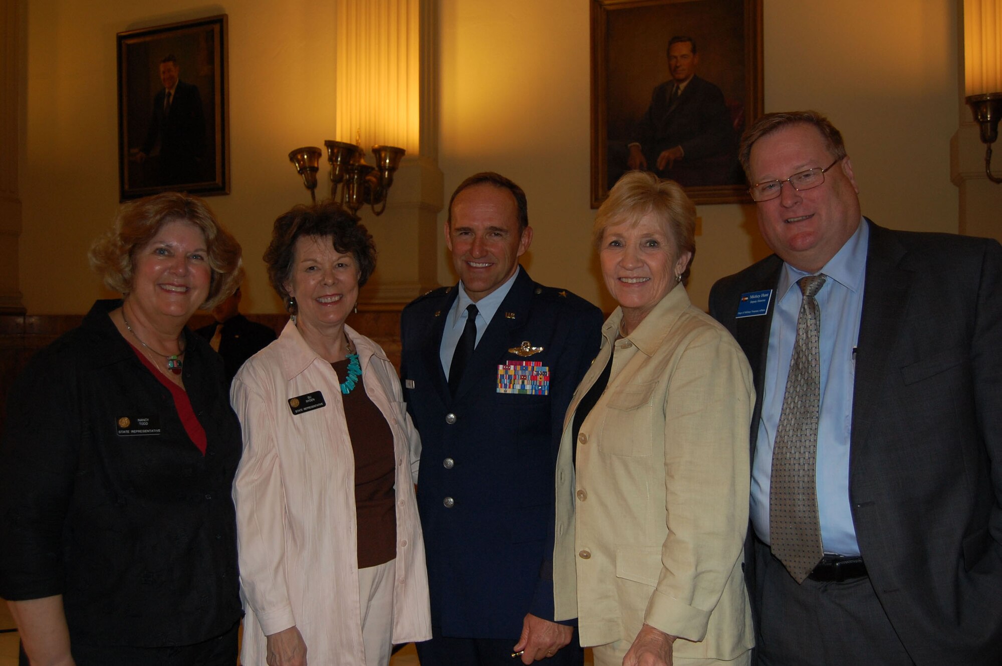 (From left to right) Rep. Nancy Todd, Rep. Su Ryden, Brig. Gen. Trulan Eyre, Sen. Nancy Spence and Michael Hunt worked through the course of the legistative session to make House Bill 1201 a reality for Colorado. "This is a great day for the military installations across states," said Brig Gen. Trulan Eyre, 140th Wing Commander.