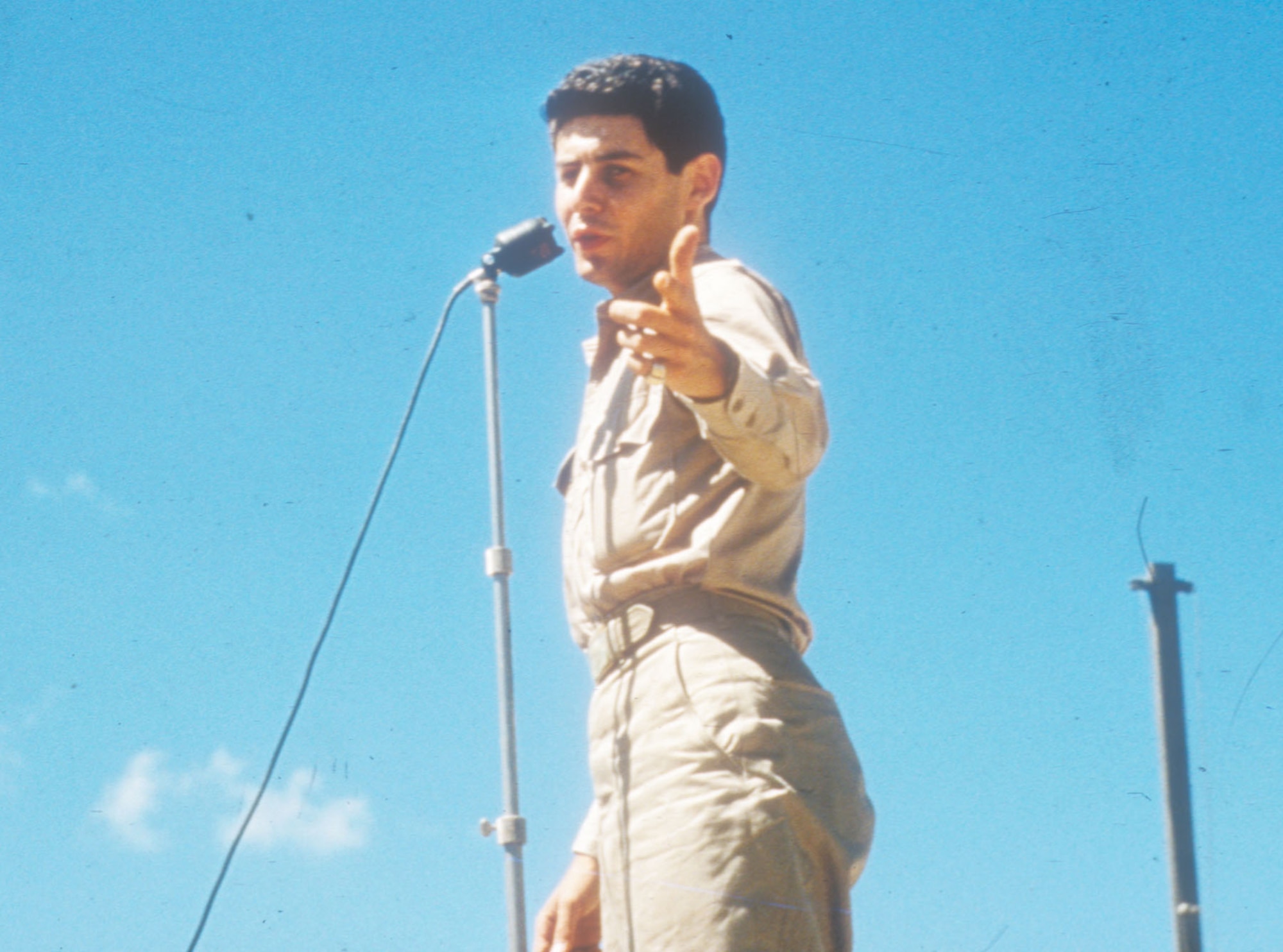 Famed entertainer Eddie Fisher performs in a USO show at K-9 (Pusan East) in August 1952. (U.S. Air Force photo)