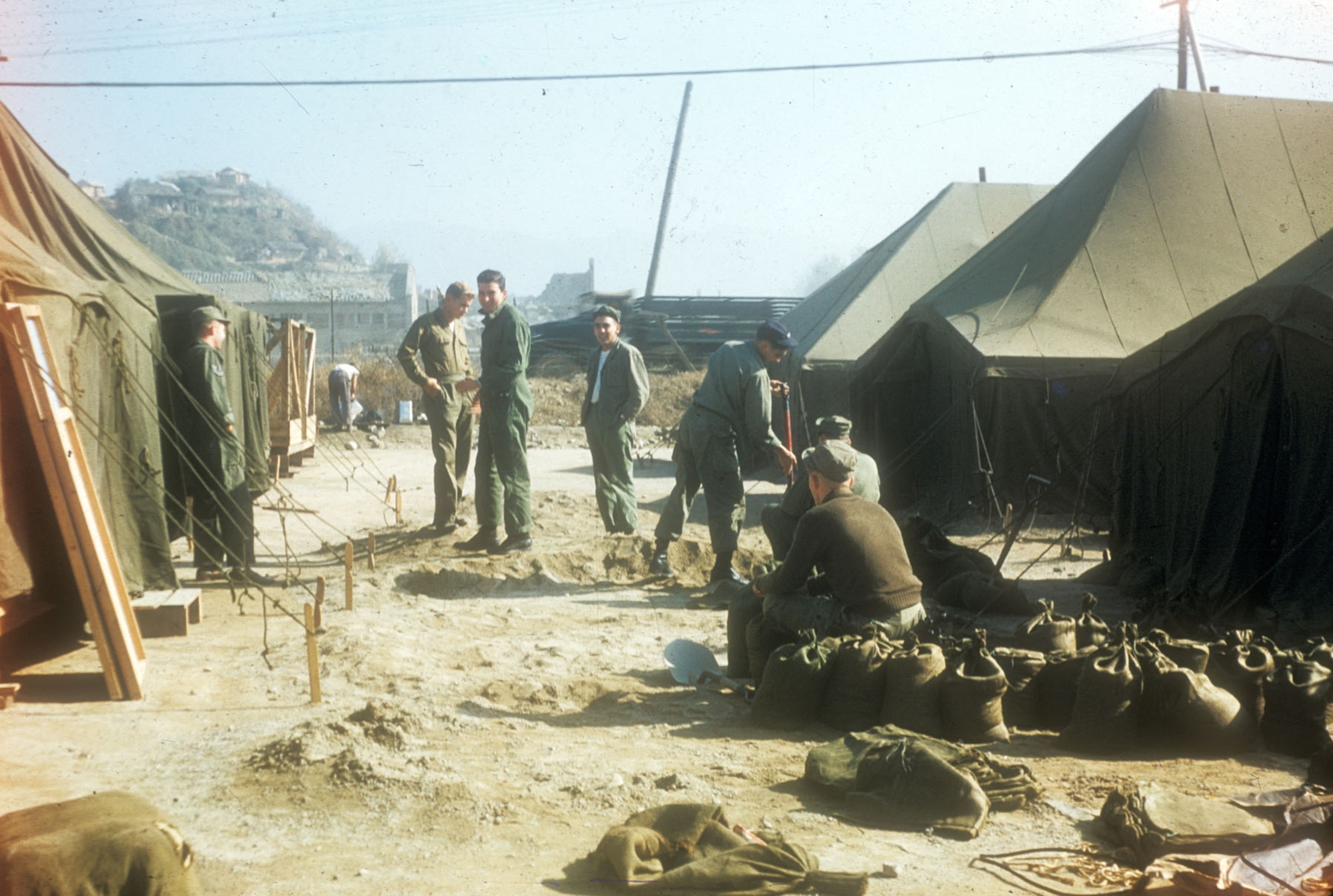 These Airmen are filling sandbags for protection against bomb and artillery shell fragments. (U.S. Air Force photo)