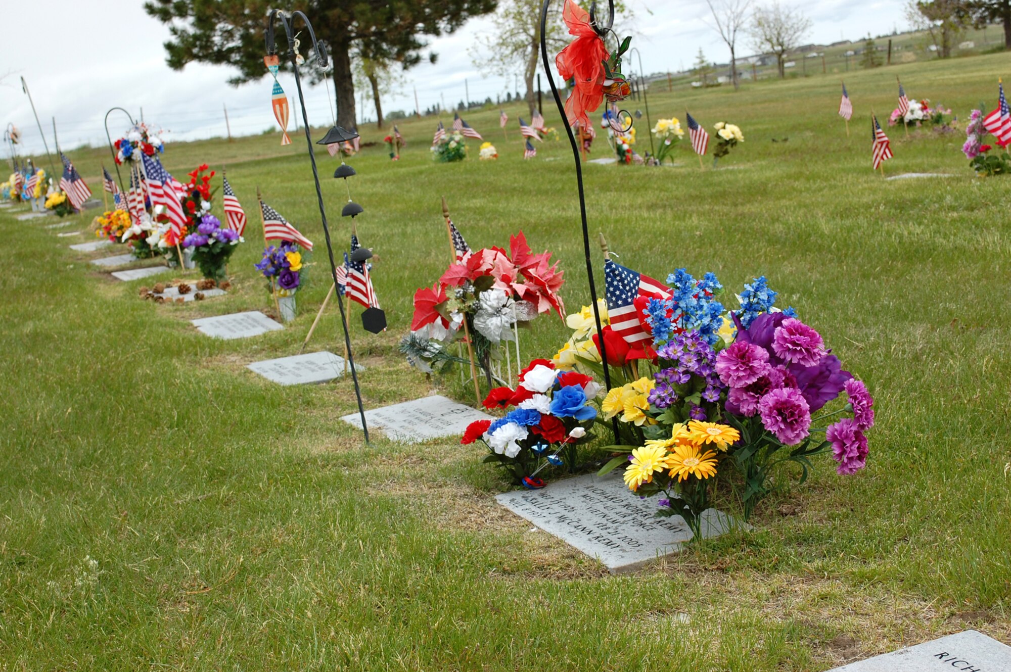 Veterans’ gravestones were decorated to display their heroic deeds and patriotism during their time in military service. (U.S. Air Force Photo/Airman 1st Class Kristina Overton)