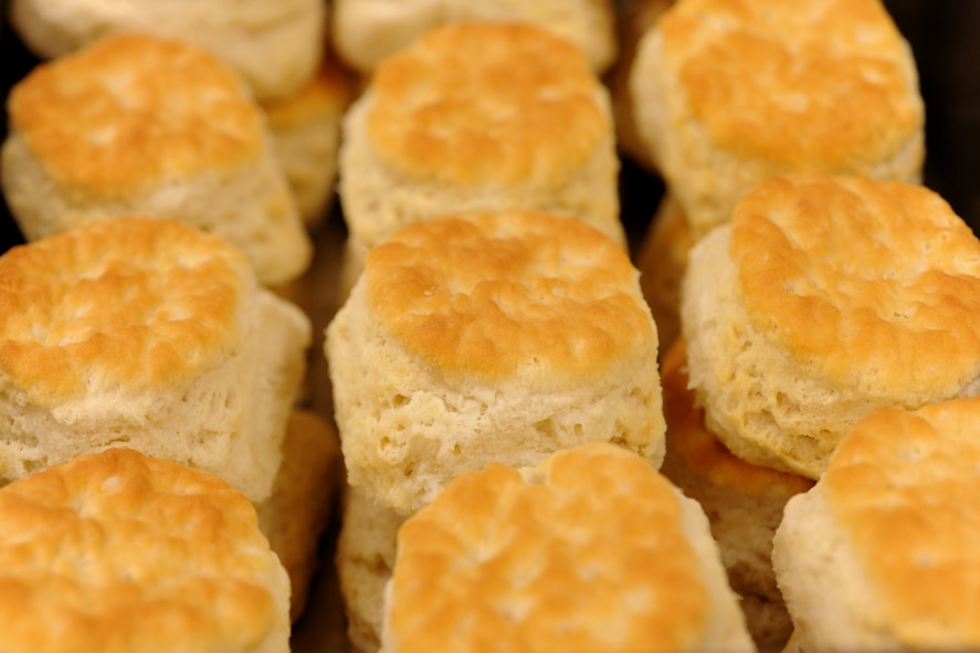 MOODY AIR FORCE BASE, Ga. -- Fresh made biscuits out of the oven sit in a pan waiting to be taken to the line for breakfast comers here May 25. The dining facility provides food for all of Moody Airmen and focus on feeding the Airmen who live on base providing them with a place to eat on a regular basis. (U.S. Air Force photo by Airman 1st Class Joshua Green/RELEASED)