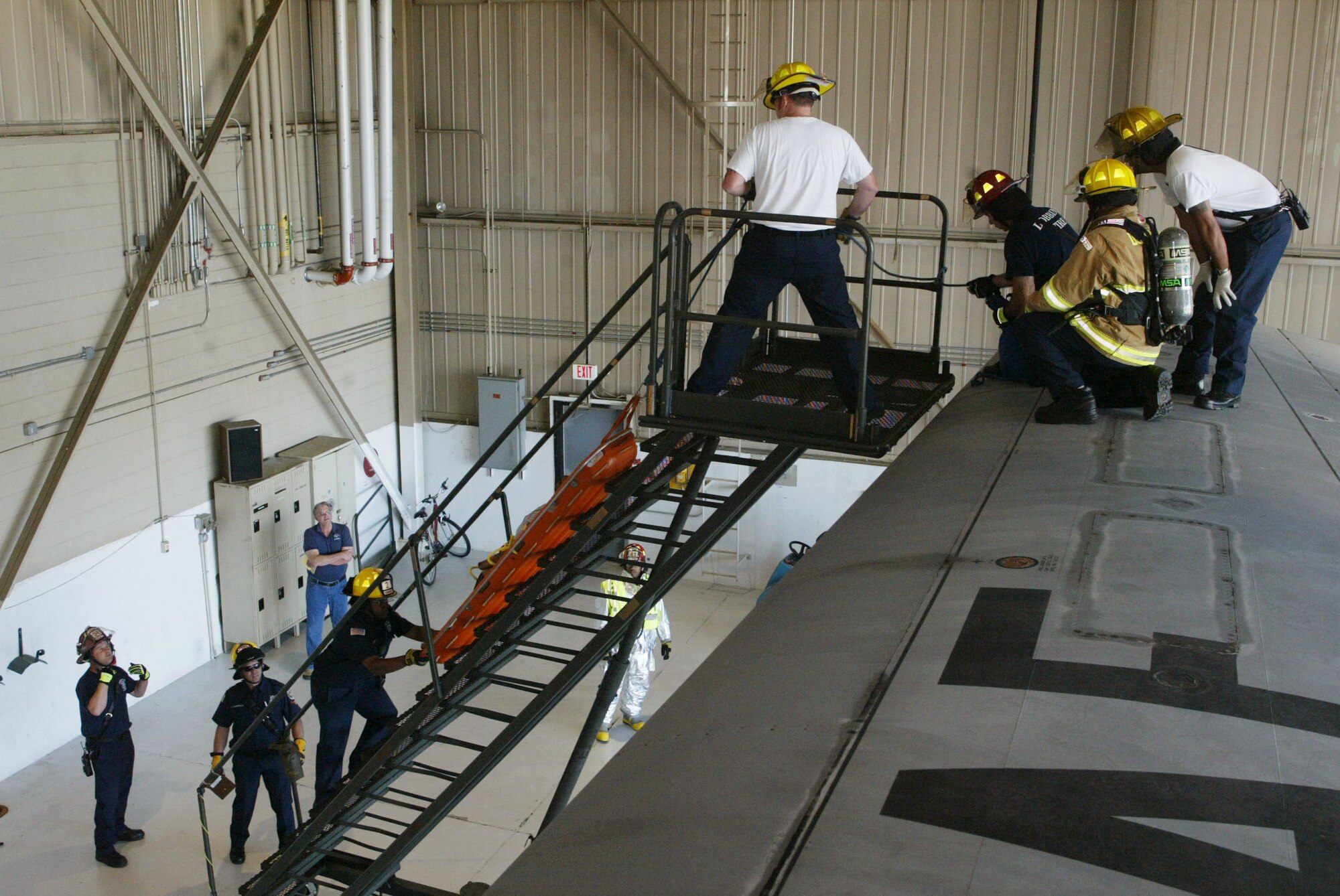 Rescue exercise from a C-130 aircraft wing.
