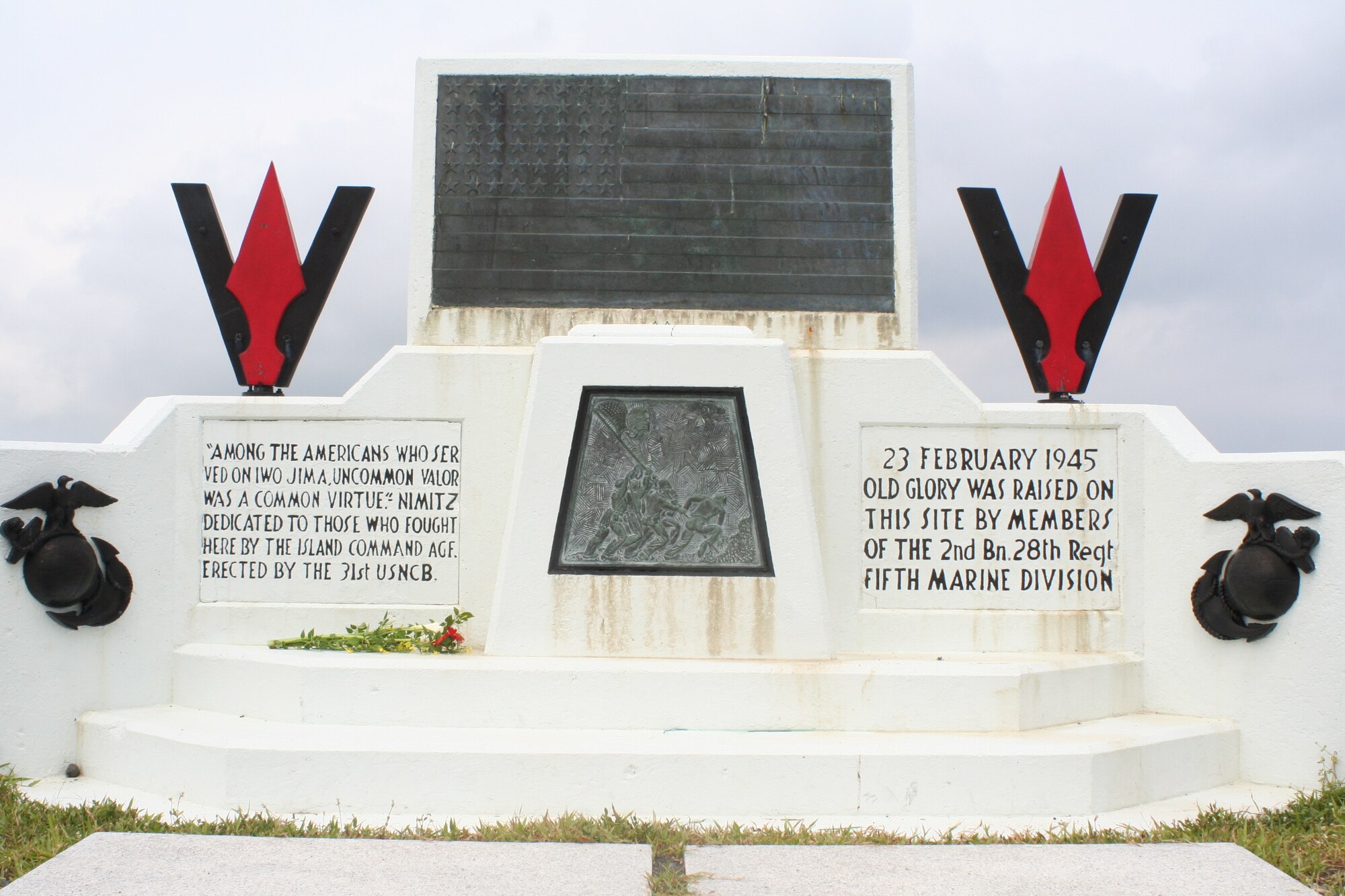 Kadena Airmen and Marines view one of the monuments erected in remembrance to those who fought in the battle of Iwo Jima, May 28. Mr. D’Angina, 353d Special Operations Group historian and Dr. Ian Spurgeon, 18th Wing historian, gave the Airmen and Marines a better perspective of the historical conflict in the Pacific theater as they toured through the caves, tunnels, the airfield, and the most prominent feature of the island, Mount Suribachi.  (Courtesy photo)      