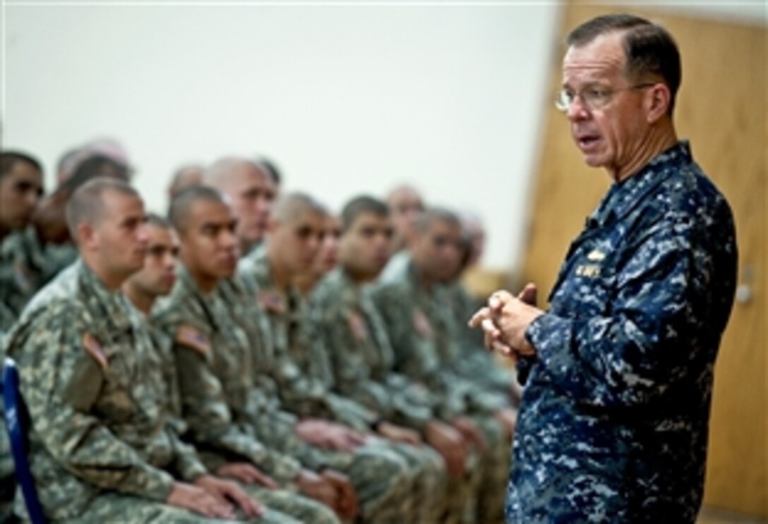 Navy Adm. Mike Mullen, chairman of the Joint Chiefs of Staff, visits recruits in the Basic Combat Training Course on Fort Benning, Ga., June 4, 2010.