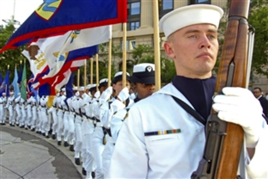 U.S. Navy sailors stand during the 68th anniversary of the historic Battle of Midway ceremony at the United States Navy Memorial in Washington, D.C., June 4, 2010.