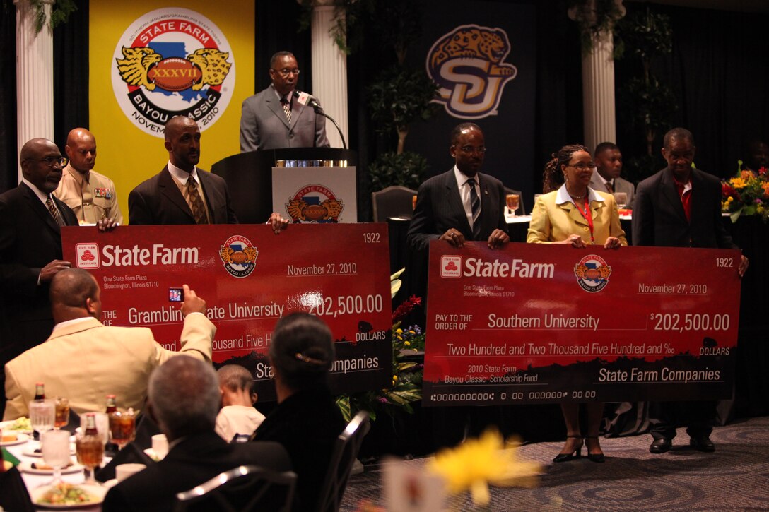 Both Grambling State University and Southern University are presented nearly half a million dollars from the State Farm Scholarship Fund at the Bayou Classic coaches’ luncheon Nov. 26. Grambling State University beat Southern University in the Bayou Classic the next day.