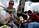U.S. military members and people from Santa Cruz del Quiche, Guatemala, offload disaster relief supplies from a Joint Task Force-Bravo CH-47 Chinook June 5. Joint Task Force-Bravo’s helicopters have transported approximately 94,000 pounds of relief supplies since June 2 to Guatemalan communities in need. (U.S. Air Force photo by Staff Sgt. Bryan Franks)

