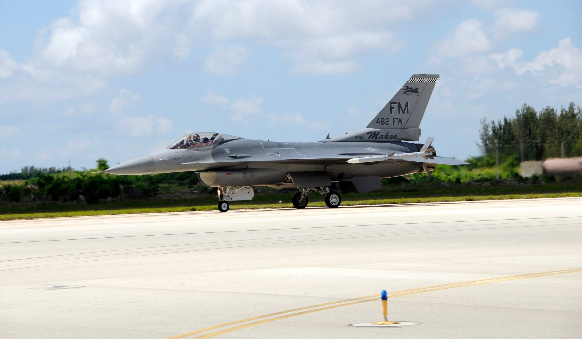 Brig. Gen. William "Blaze" Binger, 482nd Fighter Wing commander rolls out after touching down for his final flight in an F-16 on June 3.  General Binger is a command pilot flying fighter jets for 29 years accumulating over 4,500 hours in the F-16 including 40 combat missions over Iraq. He assumed command of the 482nd FW in May 2008. Next week Binger will head to his new job at Robins Air Force Base, Ga., to become commander of the newly formed Force Generation Center, Headquarters Air Force Reserve Command. (U.S. Air Force photo/TimNorton)