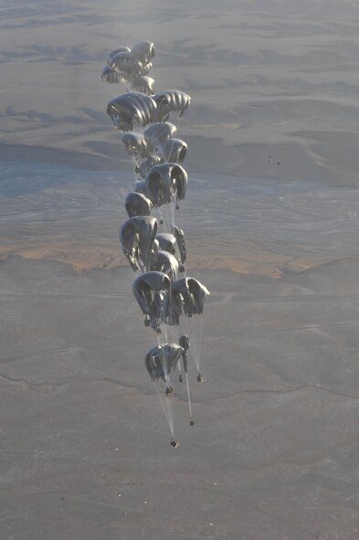 Container delivery system bundles float to the ground during an airdrop mission over Afghanistan on May 27, 2010. The bundles contained food, water and fuel for the Combined Joint Special Operations Task Force. (U.S. Air Force photo/Staff Sgt. Quinton Russ) 