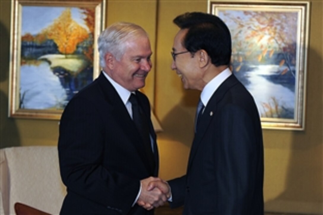 U.S. Defense Secretary Robert M. Gates greets Republic of Korea President Lee Myung-Bak at the 9th International Institute for Strategic Studies, The Shangri-La Dialogue, in Singapore, June 5, 2010.  